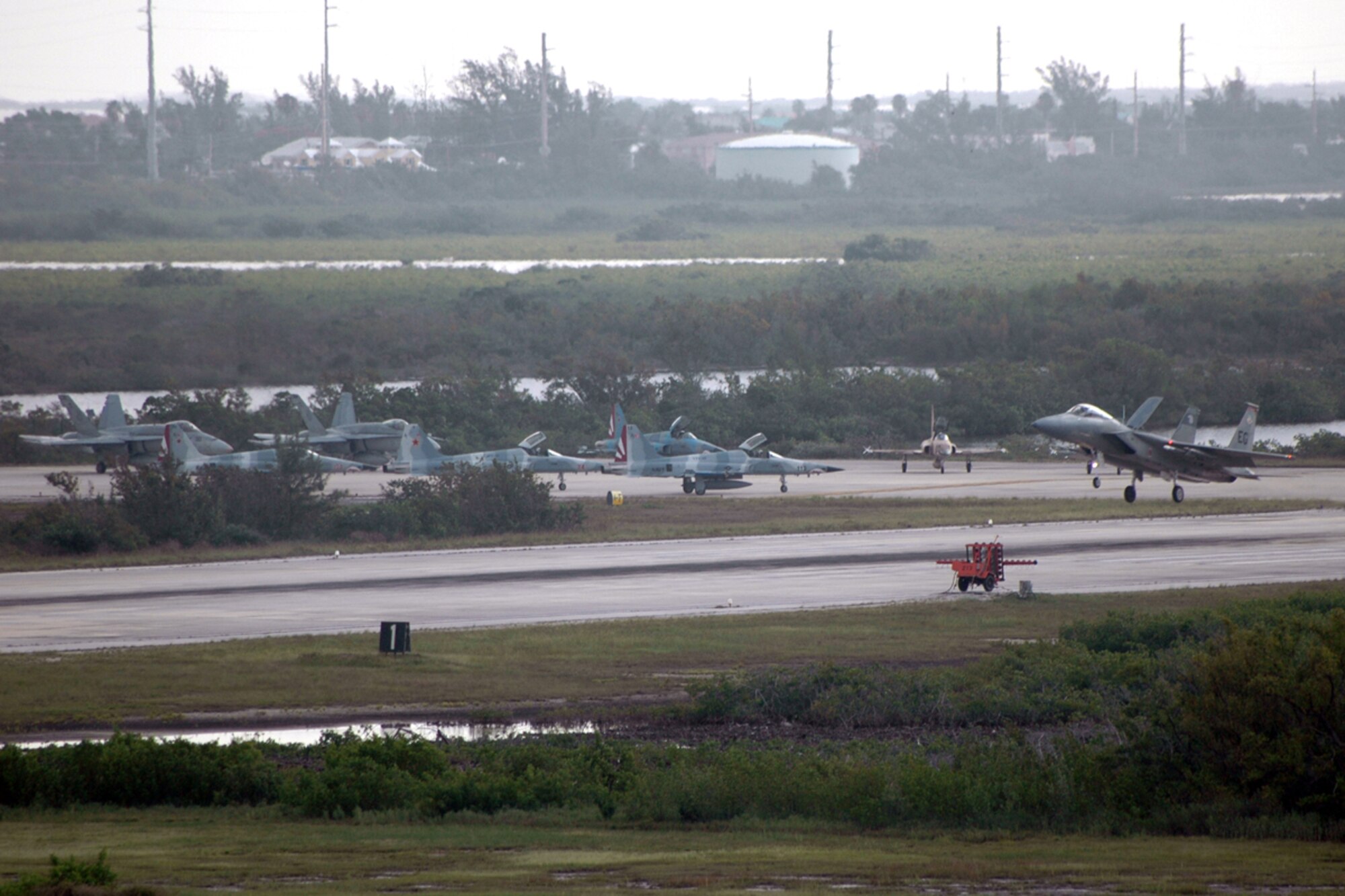 NAVAL AIR STATION KEY WEST, Fla. -- The 60th Fighter Squadron from the 33rd Fighter Wing at Eglin Air Force Base, Fla., deployed 16 F-15Cs and more than 200 personnel June 15 for two weeks of dissimilar air combat training as an exercise in joint training operations with the Navy. (U.S. Air Force photo by Jenna McMullin)