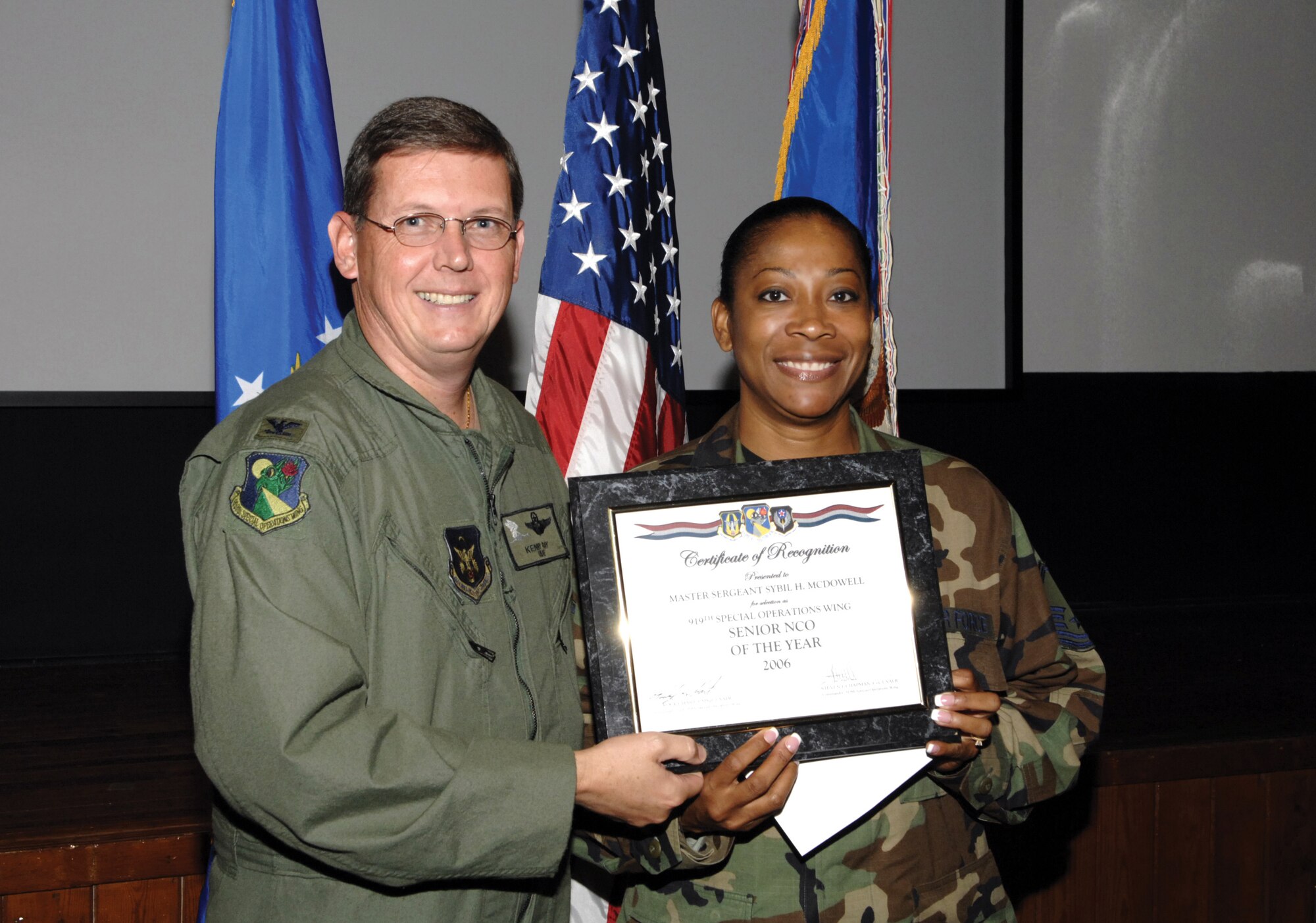 Master Sgt. Sybil McDowell (right), wing career advisor was named Duke Field's Senior NCO of the Year for 2006. Tech. Sgt. Cindy Tankersley, 719th Maintenance Squadron, is the wing's NCO of the Year and Senior Airman VaShawn Guice is the Airman of the Year. (U.S. Air Force Photo\Mike Fleck)
