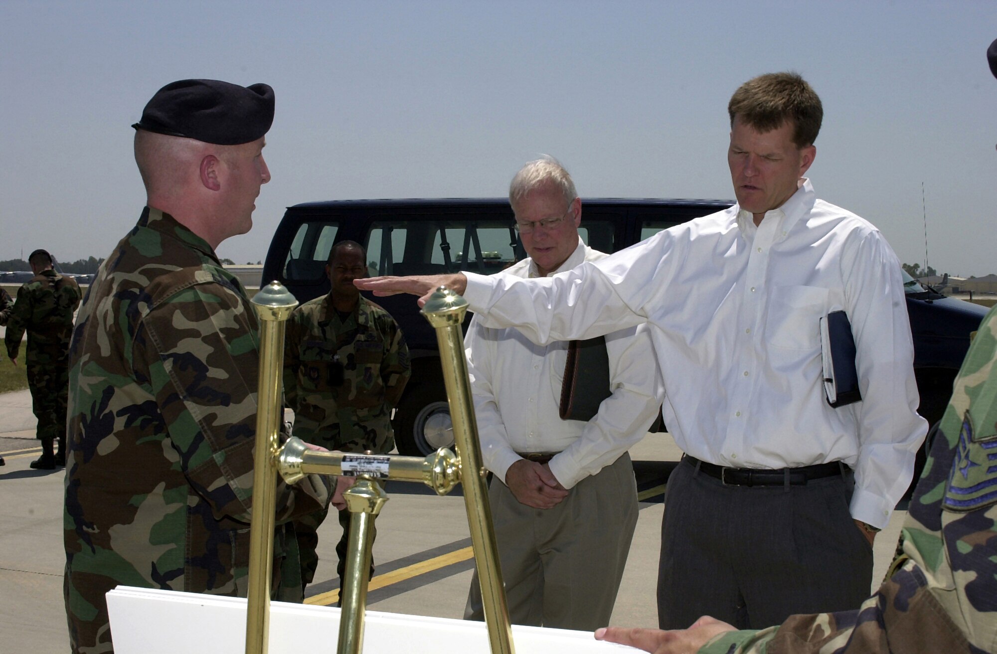 Dr. Ron Ritter, Special Assistant for the Air Force Smart Operations to the Secretary of the Air Force, discusses flightline operations with Capt. James Alves, 39th Security Forces Squadron operations officer, during his visit to Incirlik Air Base, Turkey June 25. (U. S. Air Force photo by Staff Sgt. Jeff Nevison)                              