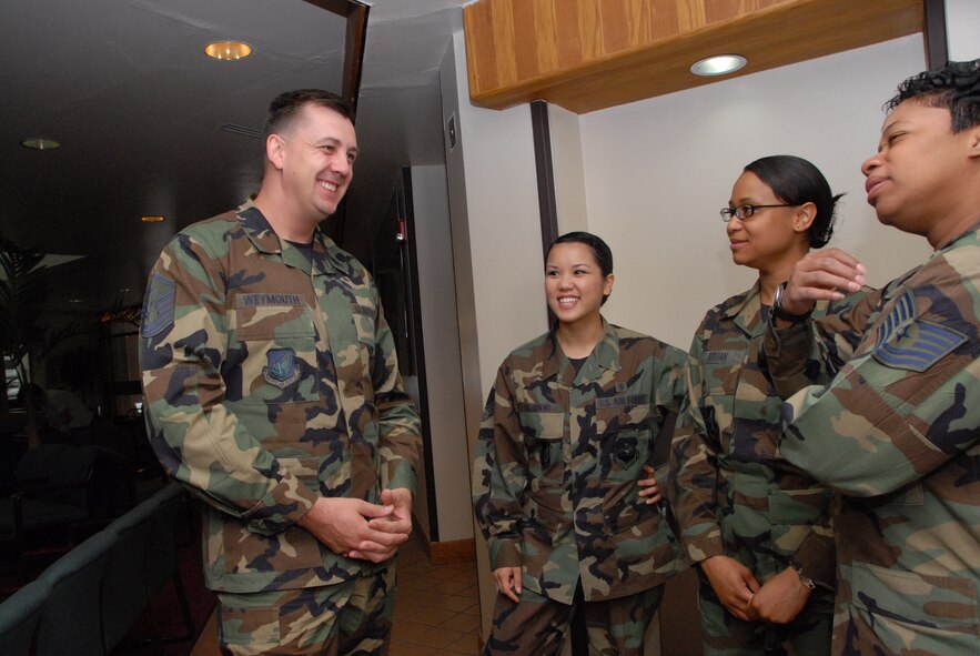 OSAN AIR BASE, Republic of Korea -- Master Sgt. Gregory Weymouth, 51st Medical Group First Sergeant, speaks with members of the 51st Medical group as part of his day to day duties as First Sergeant.  (U.S. Air Force photo by Senior Airman Eunique Stevens)