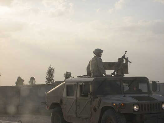 Senior Airman Christopher Cabibi, 917th Security Forces Squadron member, patrols a perimeter while deployed to Iraq. (U.S. Air Force courtesy photo)