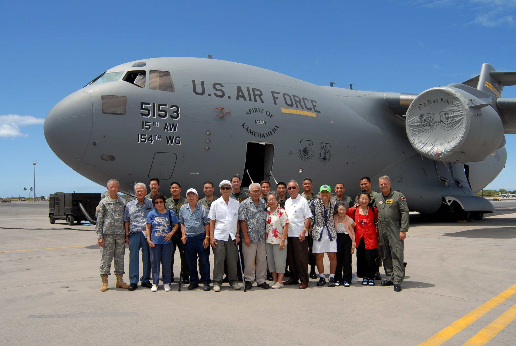 World War II veterans who served in the 100th Infantry Battalion toured a C-17 Globemaster III June 25 at Hickam Air Force Base, Hawaii.  Airmen from the Hawaii Air National Guard's 154th Wing hosted the tour.  (U.S. Air Force photo/Master Sgt. Kristen M. Higgins)
