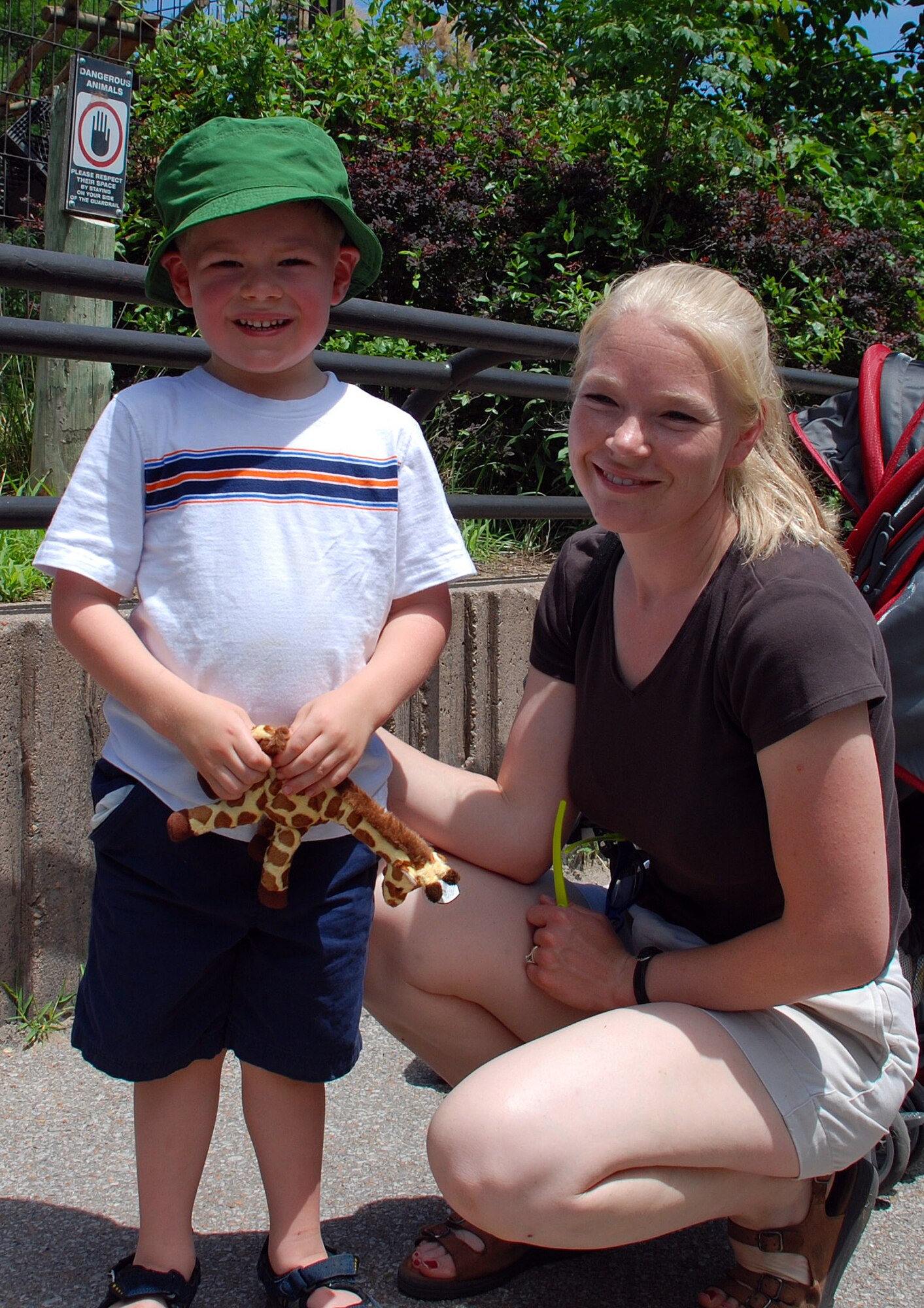 Stacy and Joseph Hanford, wife and son of deployed Capt. James Hanford, 384th Air Refueling Squadron, enjoy a weekend afternoon at the Sedgwick County Zoo June 23. Spouses and children of deployed McConnell members gathered at the zoo for a pizza lunch with the Hearts Apart program and had the opportunity to send messages through video communication to their loved ones. (Photo by Airman 1st Class Jessica Lockoski) 
