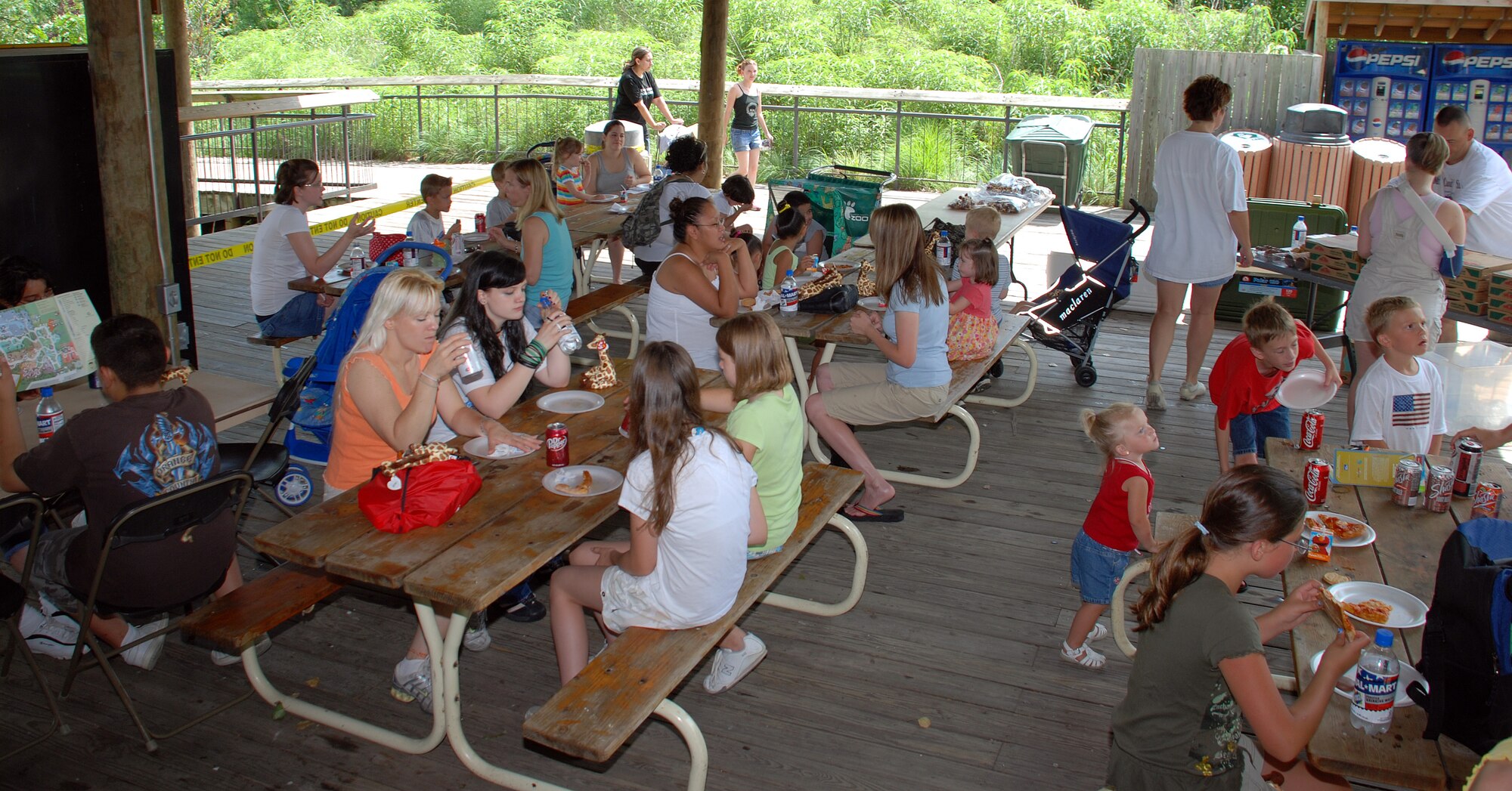 Team McConnell members participate in the Hearts Apart program while enjoying an afternoon at the Sedgwick County Zoo June 23. They ate pizza, looked at the animals and had an opportunity to send messages through video communication to their deployed loved ones. (Photo by Airman 1st Class Jessica Lockoski) 