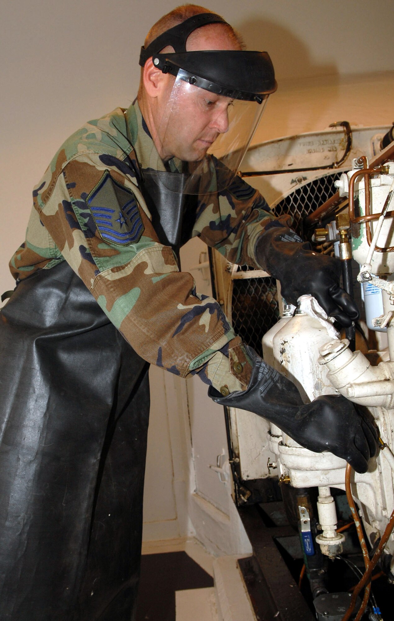 Master Sgt. Vince Munson, 12th Missile Squadron, works on equipment during an inspection visit to his facility June 14. He is the NCOIC of Missile Alert Facility operations at Fox-01. (U.S. Air Force photo/Airman 1st Class Alex Gochnour)