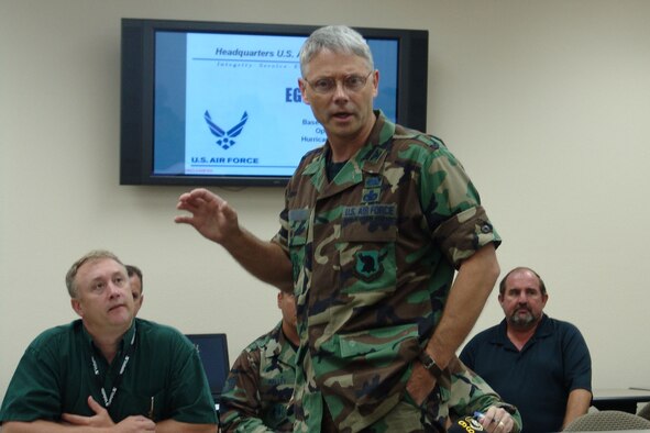 EGLIN AIR FORCE BASE, Fla.-- Col. Eric Pohland, 96th Air Base Wing vice commander, discusses base recovery with personnel at the Emergency Operations Center. The briefing was during the base's annual hurricane exercise after Hurricane Zada made landfall. (USAF photo by Lois Walsh)