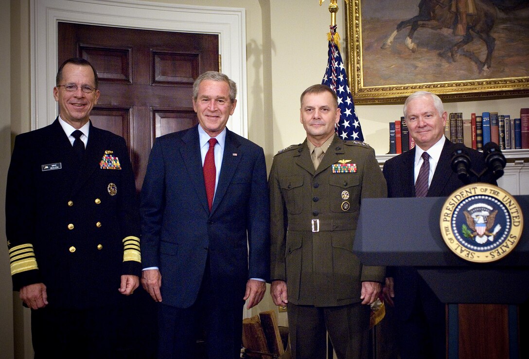 Chief of Naval Operations Adm. Michael Mullen, President Bush, Commander of U.S. Strategic Command Marine Gen. James E. Cartwright, and Secretary of Defense Robert Gates are photographed following Mullen's and Cartwright's nominations for chairman and vice chairman of the Joint Chiefs of Staff, in the Roosevelt Room at the White House, June 28, 2007.