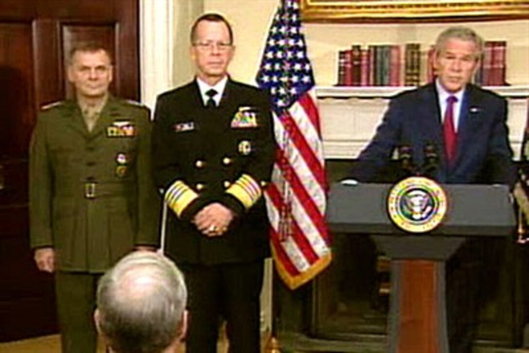 President Bush makes his official announcement nominating Chief of Naval Operations Adm. Michael G. Mullen (center) to be Chairman of the Joint Chiefs of Staff and Marine Gen. James E. Cartwright to be Vice Chairman, June 28, 2007, from the White House.