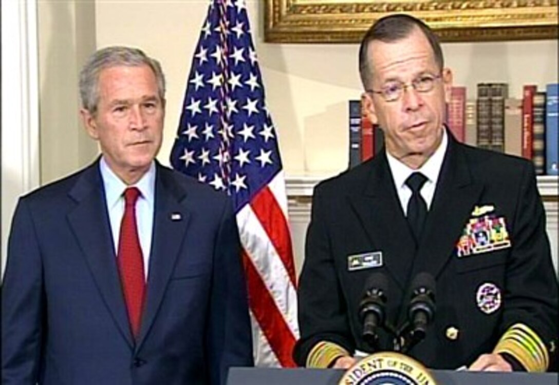 President Bush stands by after making his official announcement nominating Chief of Naval Operations Adm. Michael G. Mullen to be Chairman of the Joint Chiefs of Staff, June 28, 2007, from the White House.