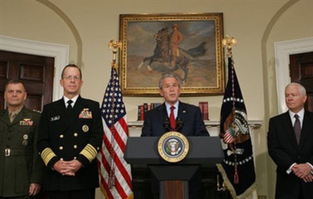 President Bush stands with Marine Gen. James Cartwright (left), Navy Adm. Michael Mullen and Secretary of Defense Robert Gates as he announces his nomination of Mullen as chairman, and Cartwright as vice chairman, of the Joint Chiefs of Staff, June 28, 2007, at the White House.