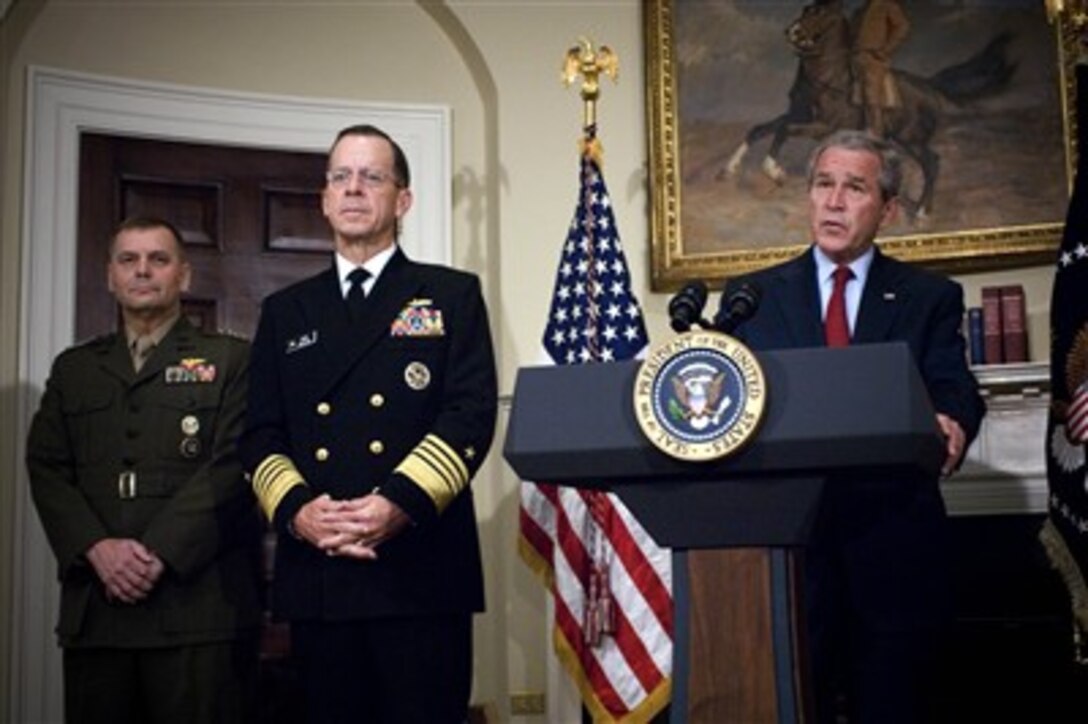 President George W. Bush (right) announces the nomination of Adm. Mike Mullen (2nd from left), US. Navy, and Gen. James E. Cartwright as Chairman and Vice-Chairman of the Joint Chiefs of Staff, respectively, in the Roosevelt Room at the White House on June 28, 2007.  Mullen is currently the Chief of Naval Operations and Cartwright is the Commander of the U.S. Strategic Command.   