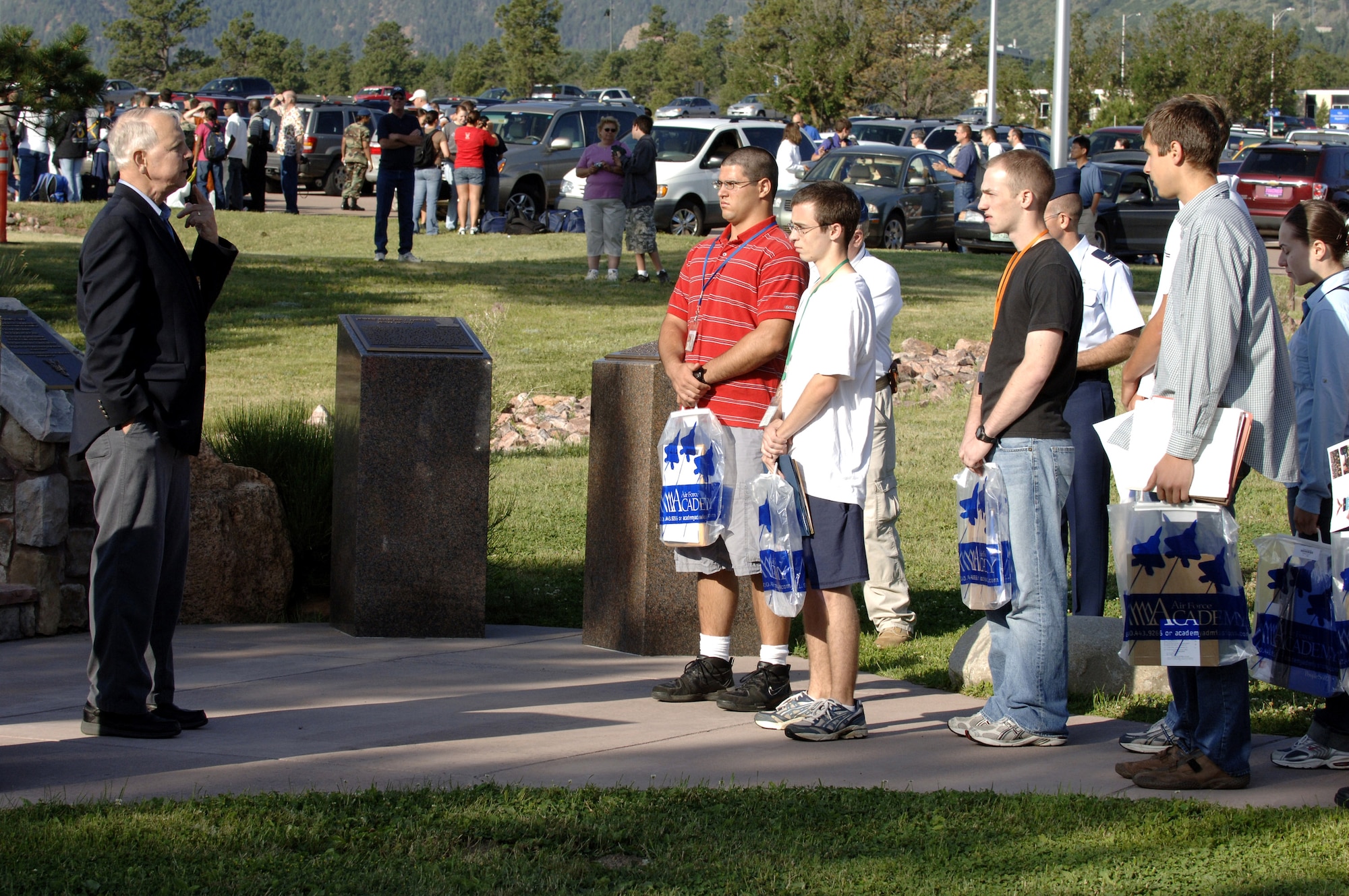 Basic cadet trainees receive a briefing at the Challenge Bridge on the heritage trail behind Doolittle Hall from a retired Maj. Gen. Charles Pete as part inprocessing as the Class of 2011 June 28 at the U.S. Air Force Academy in Colorado. General Pete was in the U.S. Air Force Academy graduating class of 1959 . The 1,304 members arrived June 28 to begin basic cadet training. (U.S. Air Force photo/Mike Kaplan) 
