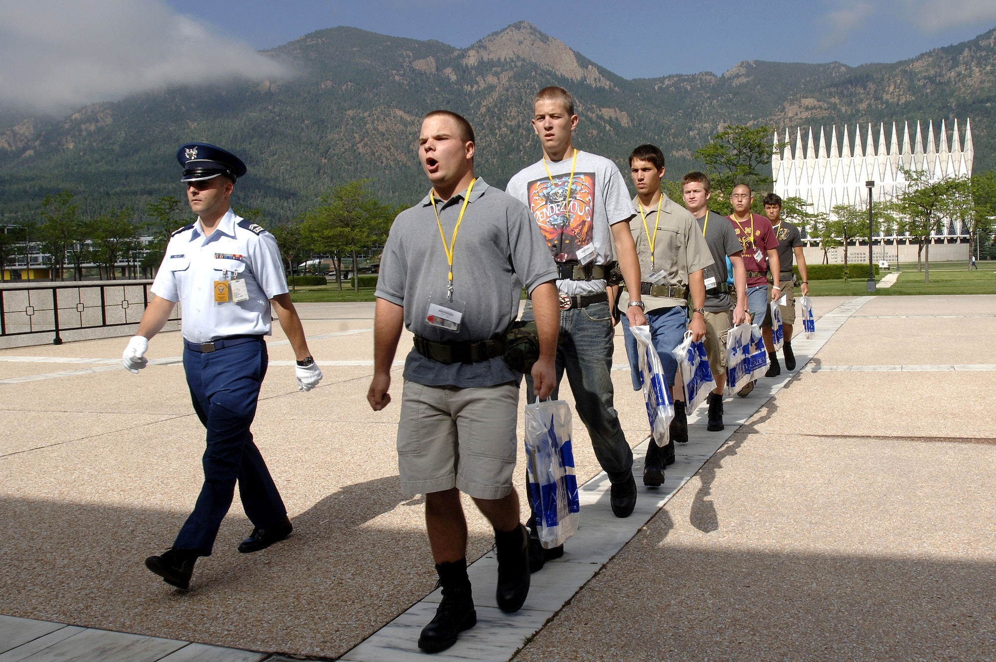 Basic cadet trainees assigned to cadet squadron 31 are marched across the Terrazzo during inprocessing of the Class of 2011 June 28 at the U.S. Air Force Academy in Colorado. The 1,304 members arrived June 28 to begin basic cadet training. (U.S. Air Force photo/Mike Kaplan)