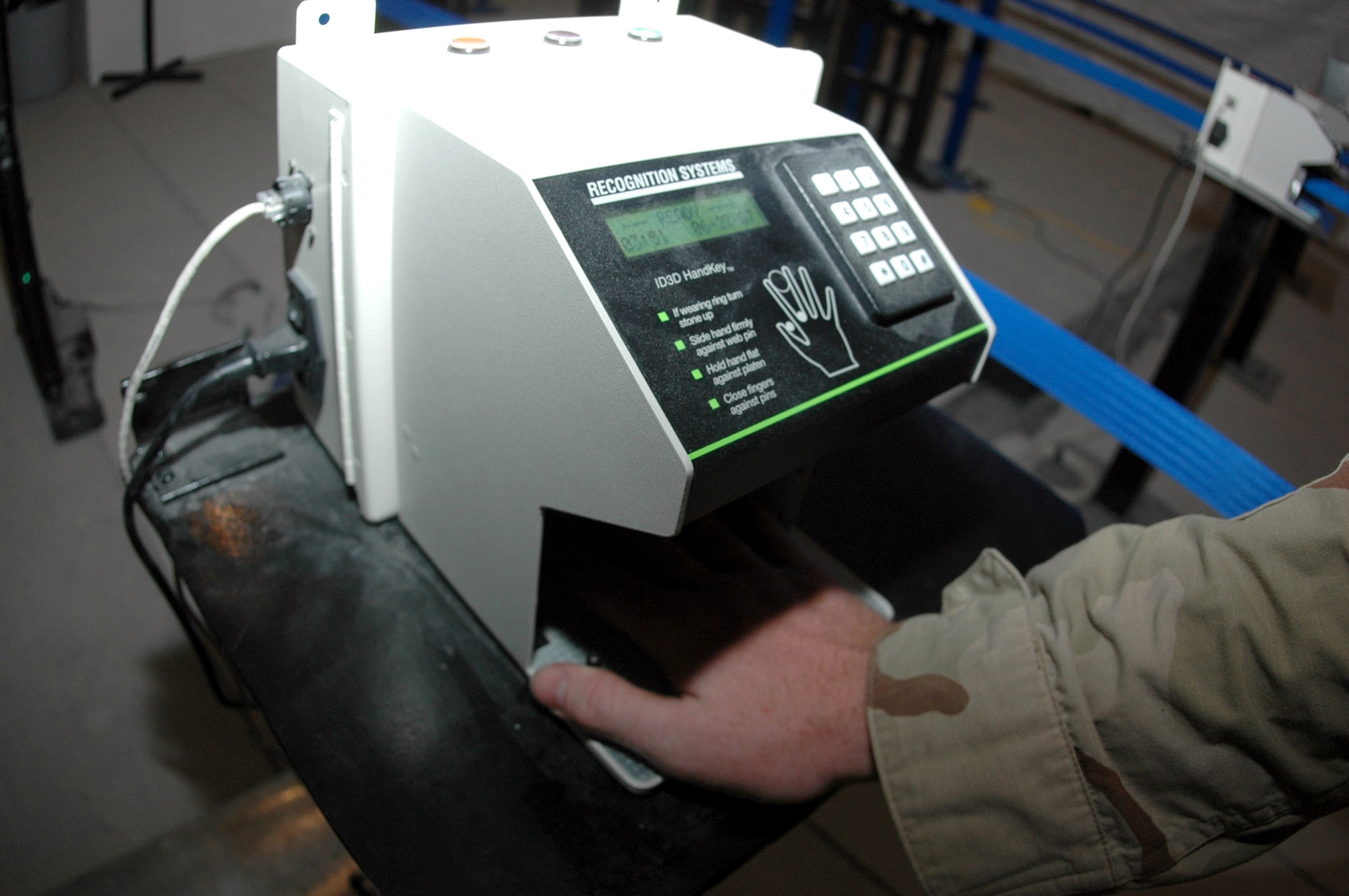A Defense Biometric Identification Database System has been installed at a base in Southwest Asia to help make operations there safer and more secure. The new system allows for tighter security while processing people on and off base more quickly. (U.S. Air Force photo/Senior Airman Clark Staehle)