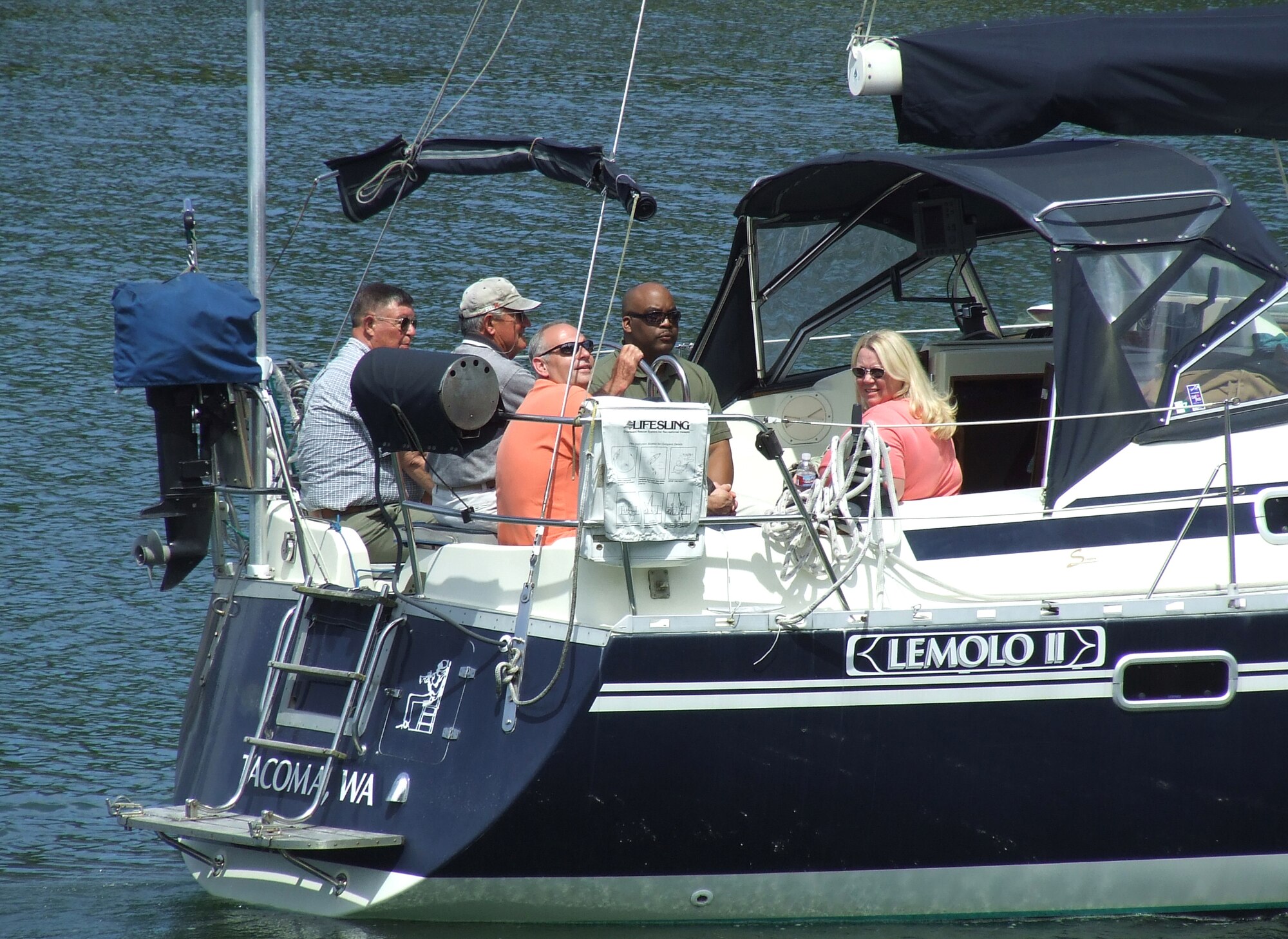 MCCHORD AIR FORCE BASE, Wash. -- Col. Shane Hershman, 62nd Airlift Wing vice commander, and his wife Gwen enjoy the sunshine at the Evergreen Fleet Cruise event at the Tacoma Yacht Club, June 20.  Dozens of generous community leaders donated their time and yachts for the annual cruise hosted by the Tacoma-Pierce County Chamber of Commerce, Tacoma Yacht Club and Harborstone Credit Union. 
(U.S. Air Force Photo/ Tech. Sgt. Carrie Bernard)
