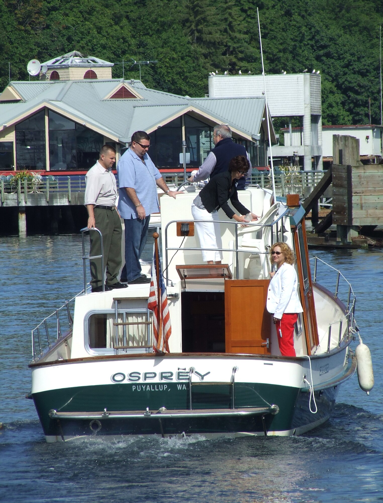 MCCHORD AIR FORCE BASE, Wash. -- Capt. Dimitri Martini, 62nd Comptroller Squadron, left, enjoys a cruise on the Puget Sound with other military members and civic leaders from the local community.
(U.S. Air Force Photo/ Tech. Sgt. Carrie Bernard)
