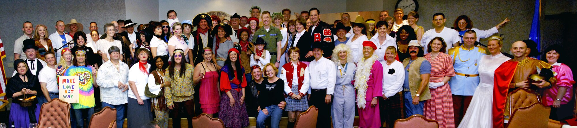 Attendees at Col. Lansen Conley's going away party assemble for a group photo. (U.S. Air Force photo/Sandy Wassenmiller)