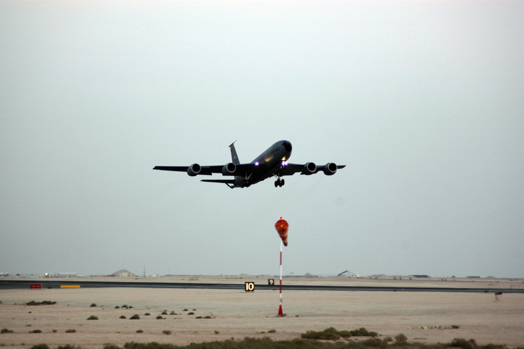 A KC-135 Stratotanker operated by the 340th Expeditionary Air Refueling Squadron takes off on a flight Wednesday. The 340th EARS has increased the number of tankers here by 13 percent to support the troop surge into Iraq. (U.S. Air Force photo by Senior Airman Clark Staehle)