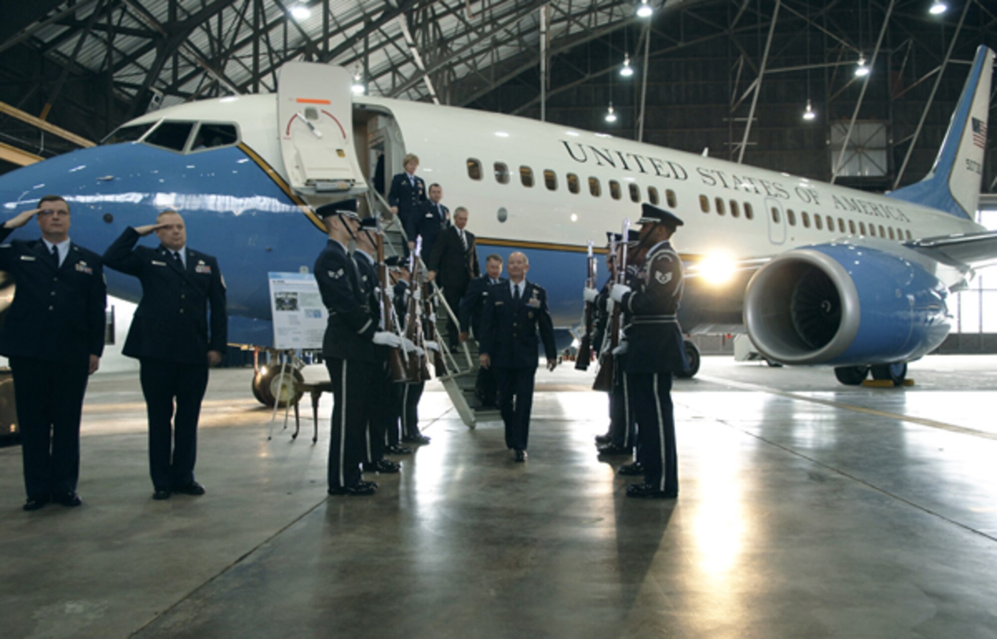 Gen. Duncan McNabb, Air Mobility Command commander, Lt. Gen. John Bradley, Air Force Reserve Command commander, Lt. Gen. (ret.) Ron Marcotte, Boeing representative, Col. Maryanne Miller, 932nd Airlift Wing commander, and Col. Al Hunt, 375th Airlift Wing commander, descend the staircase of Scott Air Force Base’s newest aircraft, the C-40C, Monday.  This is the first of three C-40Cs to be welcomed by the 932nd AW.  The new aircraft will exponentially increase the wing’s distinguished visitor transport mission, which includes airlifting dignitaries including the first lady, the chairman of the joint chiefs of staff, senators, congressmen and other military and government officials. 