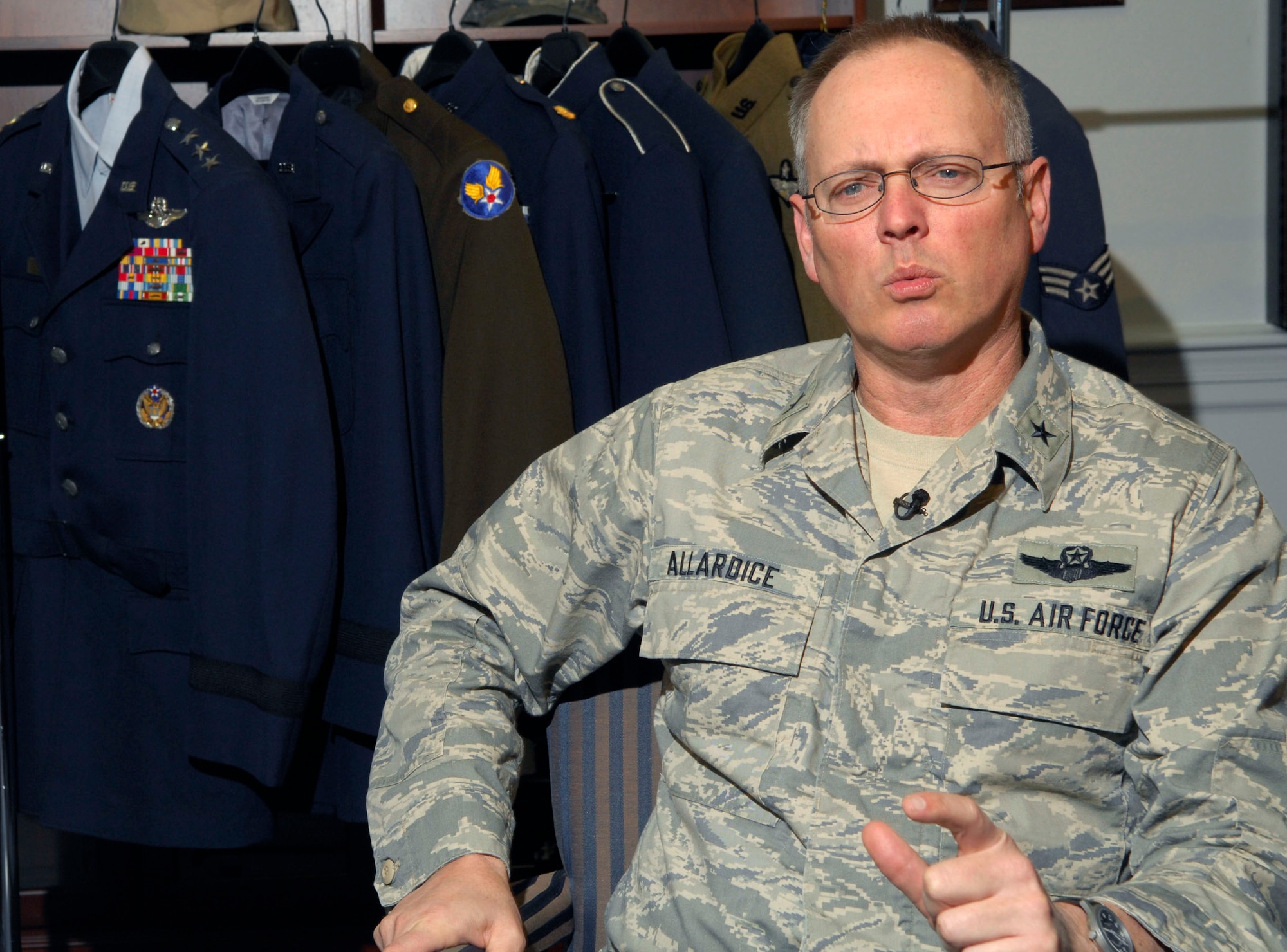 Brig. Gen. Robert R. Allardice talks about the new service coat and Airman Battle Uniform uniform during an interview Feb. 26. The new ABUs will start being distributed to Airmen participating in AEF 7 and 8 before the rest of the Air Force receives them. (U.S. Air Force photo/Tech. Sgt. Cohen A. Young) 