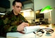 ELMENDORF AIR FORCE BASE, Alaska - Master Sgt. Kory Rivera reviews paperwork amidst overseeing the activities in his duty section. Sergeant Rivera is the NCOIC of the 3rd Medical Group Women's Health Services Flight. Sergeant Rivera was selected to receive the Air Force Association "expeditionary medics" 2007 Team of the Year Award and will represent the Pacific Air Force along with six other airmen at a ceremony in Washington D.C. April 3. (U.S. Air Force photo by Senior Airman Garrett Hothan)