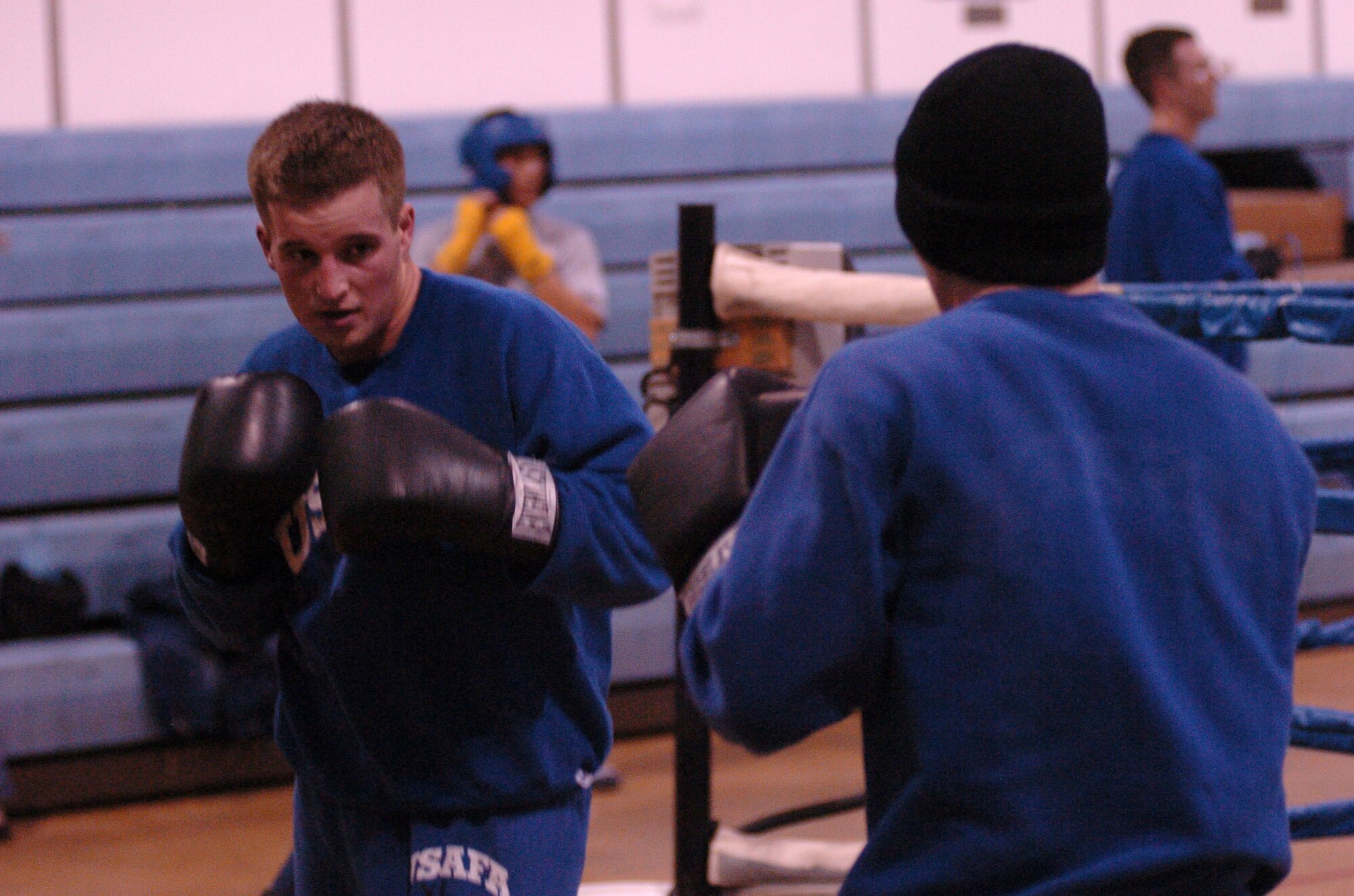 Cadet 1st Class Colin LaFavor squares off with a sparring partner at the U.S Air Force Academy's boxing gym in Colorado Springs, Colo. The boxer Cadet LaFavor recently answered to the call to be a bone marrow donor. Current procedures do not allow those who donate bone marrow to know who the recipient is, unless both parties authorize it in writing. LaFavor went on to win his next fight. (U.S. Air Force photo/1st Lt. John Ross)
