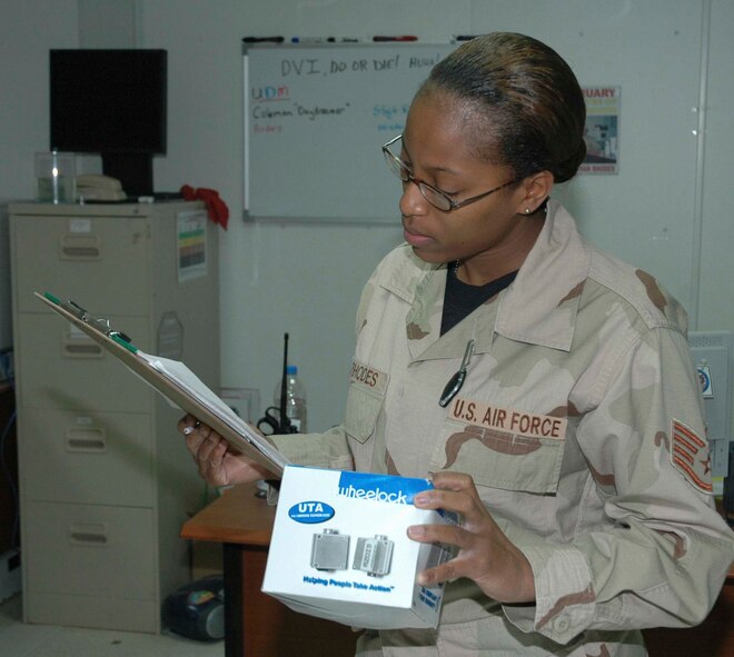 KIRKUK REGIONAL AIR BASE, Iraq -- Staff Sgt. Susan Rhodes inventories new computer parts Jan. 21 to ensure the numbers match up between the paperwork and the actual property. Sergeant Rhodes orders, tracks, expedites and receives mission-critical parts for communication systems essential to keeping Kirkuk Regional Air Base connected to the rest of the world. She is deployed from Shaw Air Force Base, S.C., where she is assigned to the 20th Logistics Readiness Squadron. (U.S. Air Force photo/Tech. Sgt. Kevin Williams)
