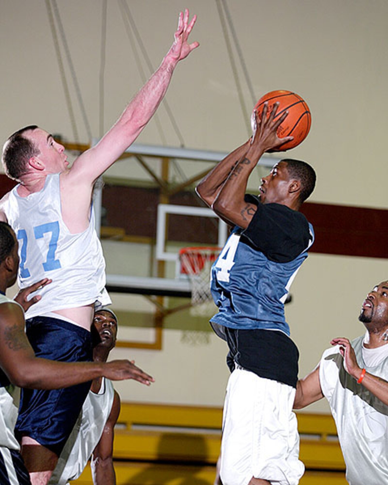 The 39th Civil Engineer, Mission Support and Services Squadron combined team beat the 39th Security Forces Squadron 48-44 in the Intramural Basketball Championship game at the fitness center Feb. 28. (U.S. Air Force photo by Ismael Gomez)
