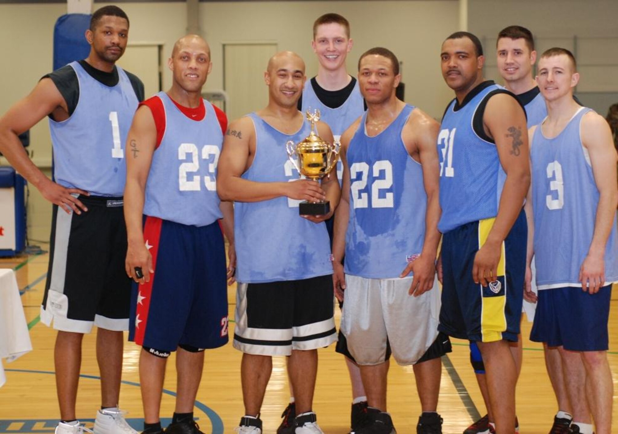 FAIRCHILD AIR FORCE BASE, Wash. -- The 92nd Civil Engineer Squadron’s under-30 intramural basketball team came out on top this season as the league champions over the 92nd Services Squadrons. From the left are Leon Sayers, Gardner Torrence, James Gasaway, Anthony Peters, Nathaniel Mahoney, Giovanni Lewis, Hans Winkler, and Jonathan Heinze.  (U.S. Air Force Photo / Staff Sgt. Michael Daniel)