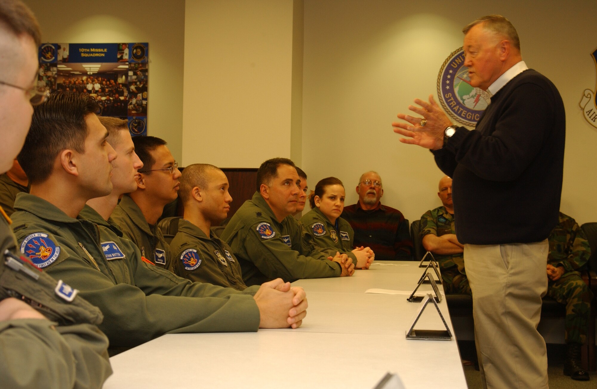 Retired Gen. Eugene Habiger talks with missile crew members at their pre-departure briefing Feb. 22. He was at Malmstrom to tour facilities and meet with personnel before delivering the keynote address at the annual awards banquet.