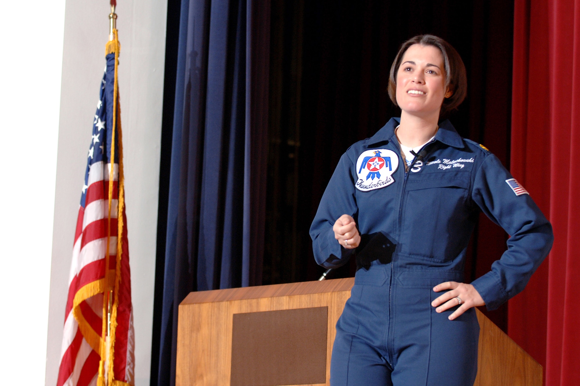 Major Nicole Malachowski an Air Force Thunderbirds Aerial Demonstration Team pilot gives a speech at the Air Force Academy's 14th Annual National Character and Leadership Symposium March 1 in Colorado Springs, Colo. Major Malachowski, a 1996 academy graduate, spoke to academy cadets and local area highschool students about teamwork and diversity in the Air Force. (U.S. Air Force photo/Joel Strayer)
