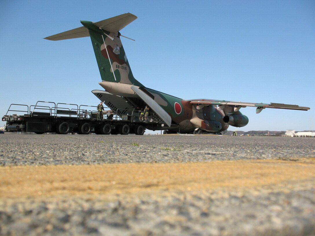 A Japan Air Self-Defense Force C-1 receives a load of cargo during Operation Freedom Lift Feb. 27 at Yokota Air Base, Japan. The plane was headed to Kadena Air Base, Okinawa, to deliver the cargo while simultaneously allowing U.S. planes to fly war on terrorism missions. (U.S. Air Force photo/Senior Airman Daniel McKittrick)