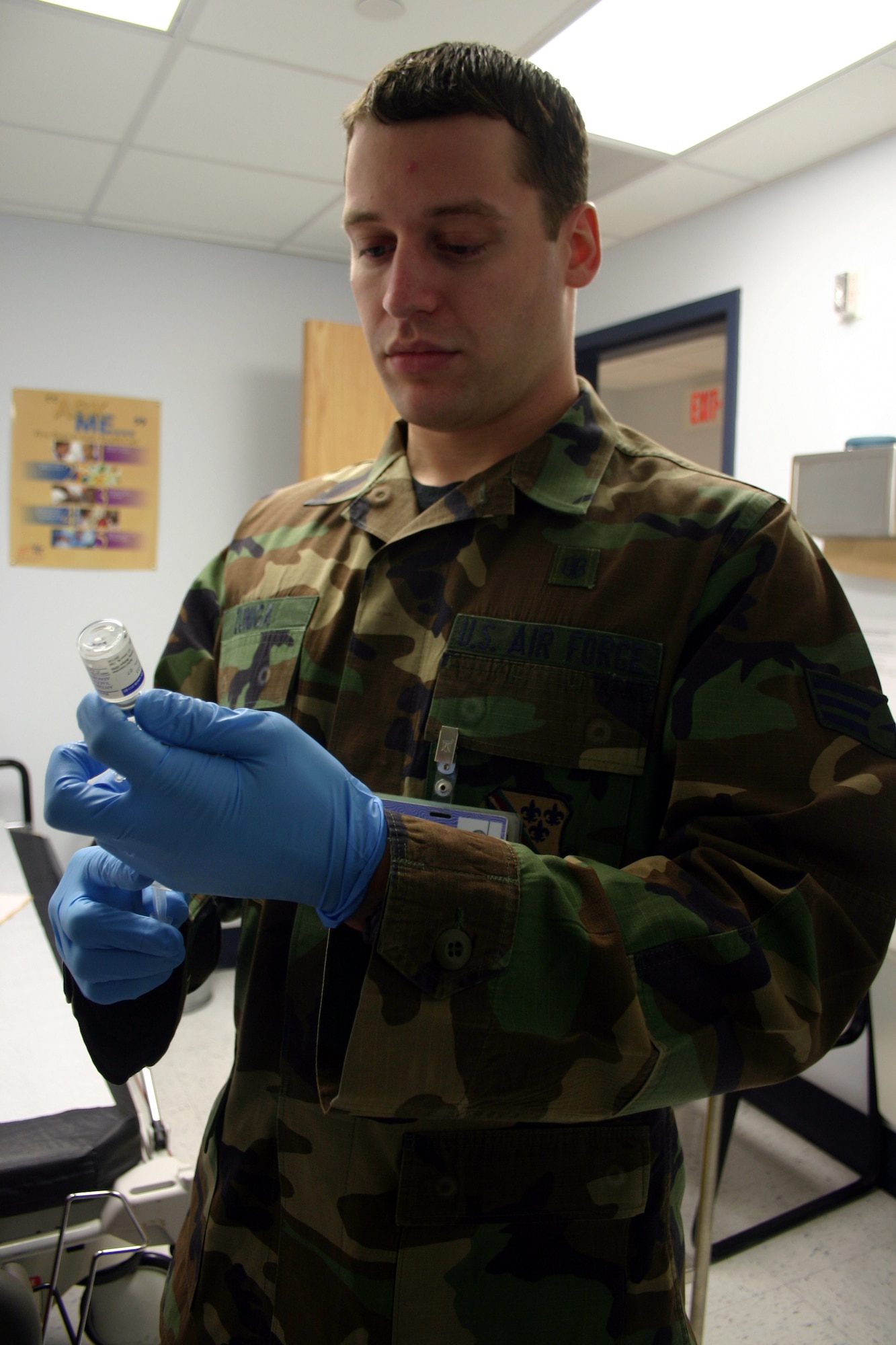 Senior Airman Robert Zuniga draws a dosage of vaccine in preparation for the re-implementation of the Anthrax inoculation program.  Airman Zuniga was named a member of the Air Force Association's 2007 Team of the Year for his work as an expeditionary medic. (U.S. Air Force photo/Staff Sgt. Tonnette Thompson)