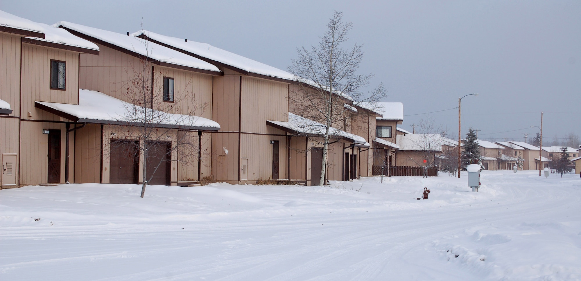 More than 300 housing units sit empty in the Sprucewood Homes edition of base housing Feb. 27 at Eielson Air Force Base, Alaska. Three hundred Air Force families had to be moved out of the privatized housing into new housing from September to December. The reason for the move was due to a conclusion of a privatized housing contract that wasn't able to be renegotiated. (U.S. Air Force photo/Staff Sgt. Matthew Rosine) 
