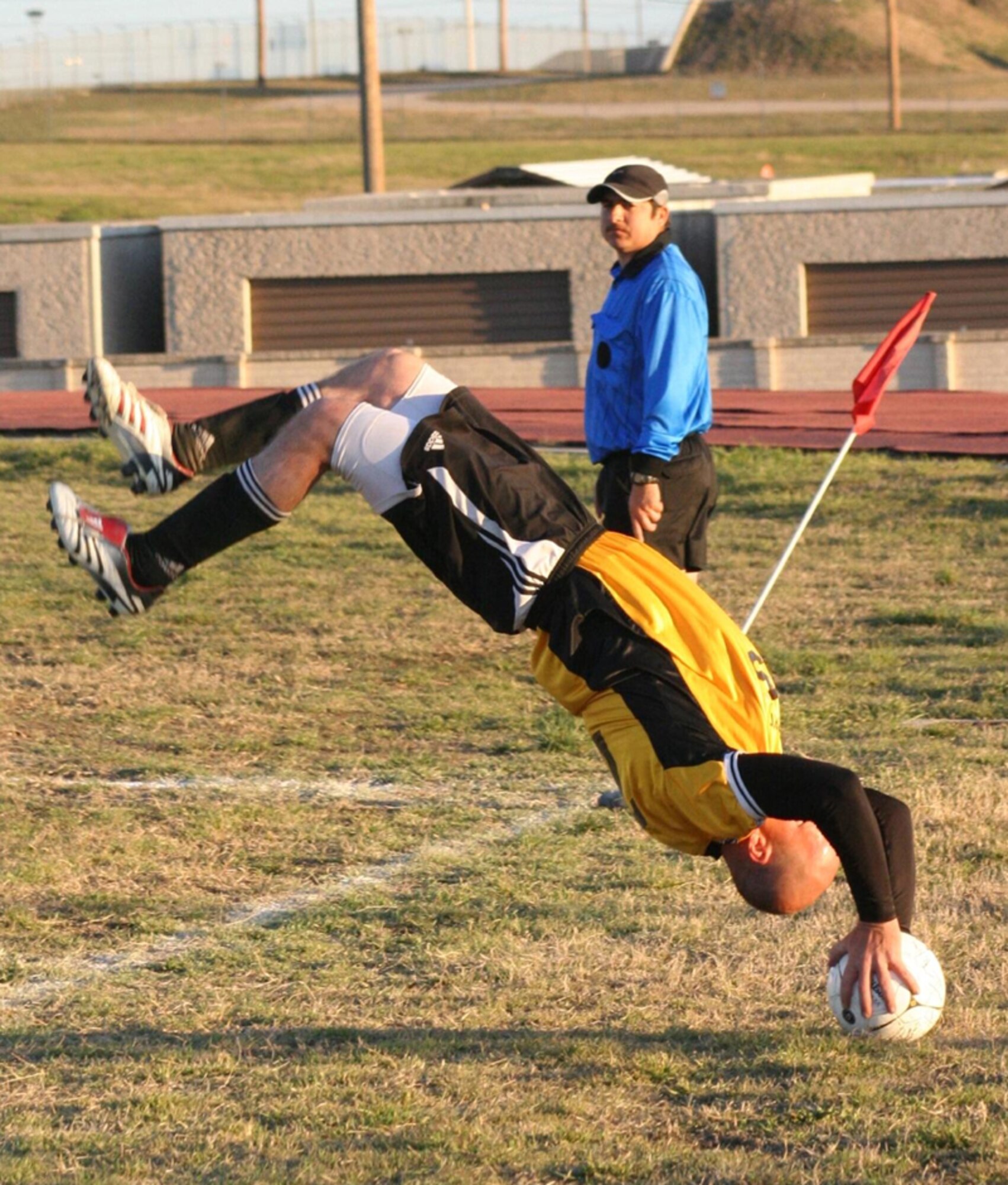 Zakary Fowkes, 373rd Training Squadron, Detachment 7, does a flip throw into the goal at the Annual Defenders Cup. (Courtesy photo)