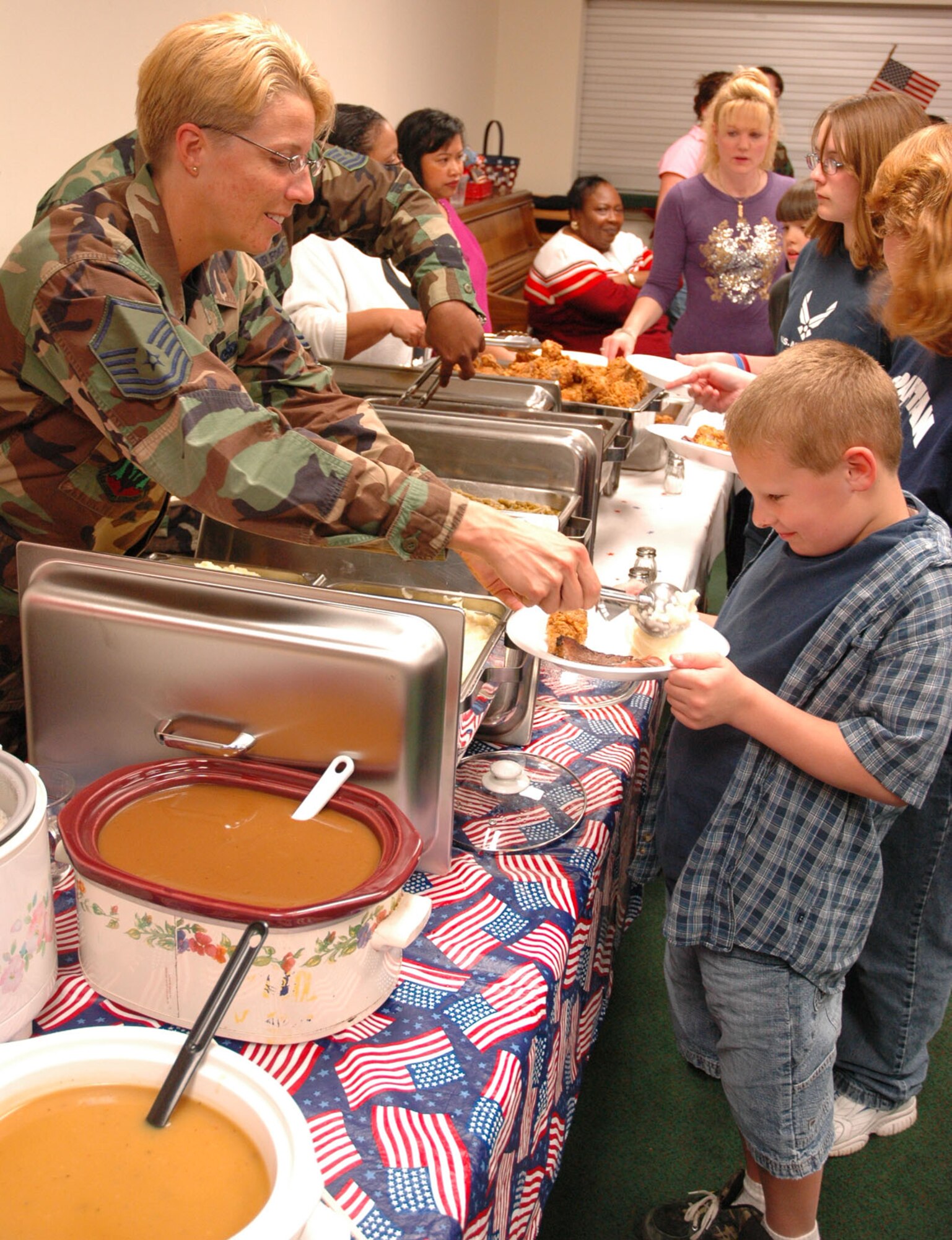 Guests of the Salute to Families event held at the Hurlburt Field Chapel Tuesday enjoy lots of home-cooked meals. 