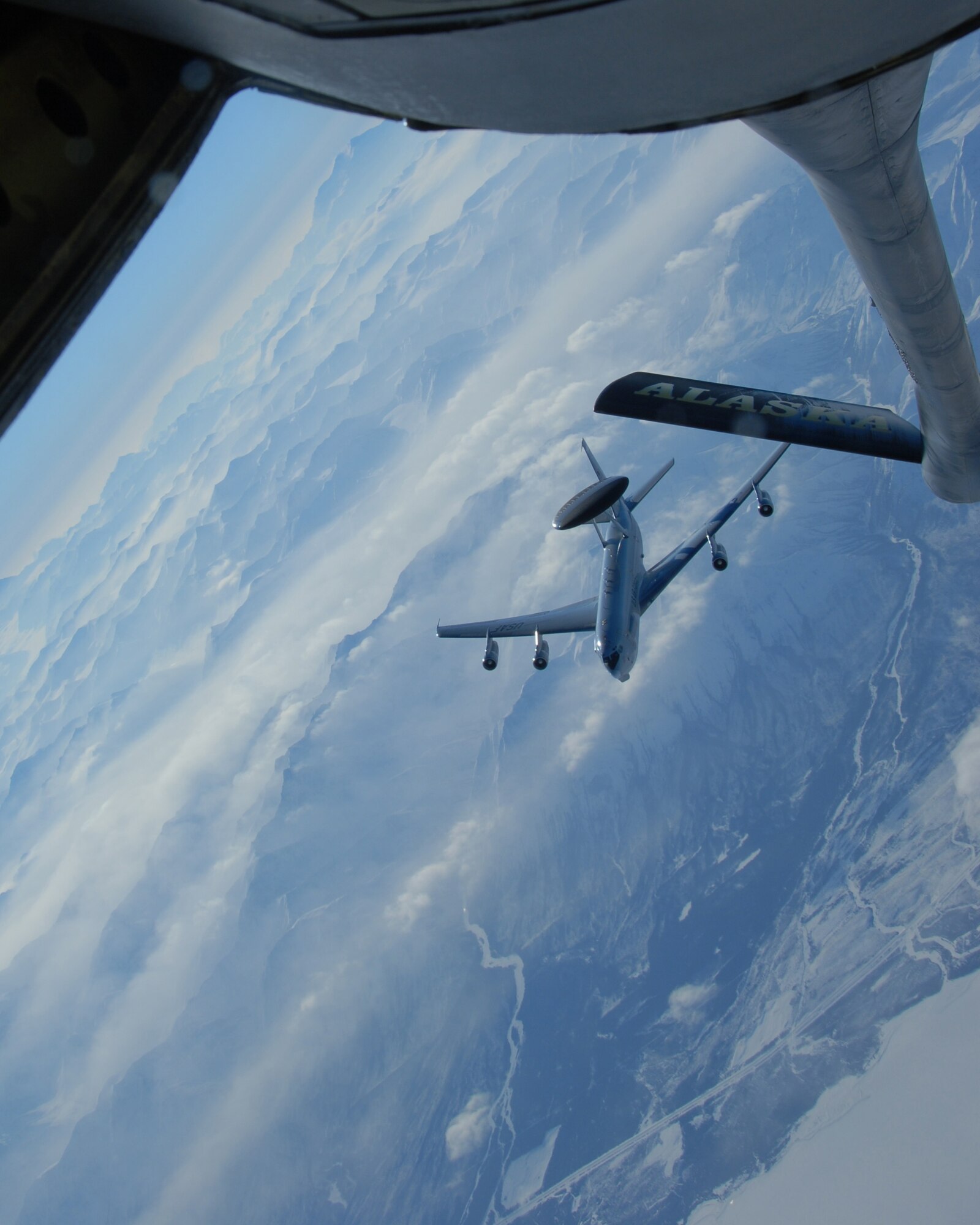 EIELSON AIR FORCE BASE, Alaska-- An E-3 Sentry (AWACS) sits in the precontact position awaiting aerial refueling by the 168th Air Refueling Wing, Alaska Air National Guard KC-135 over the arctic on Feb 27. The AWACS is assigned to the 962nd AACS, Elmendorf AFB, Alaska.(U.S. Air Force photo by Master Sgt. Robert Wieland) 