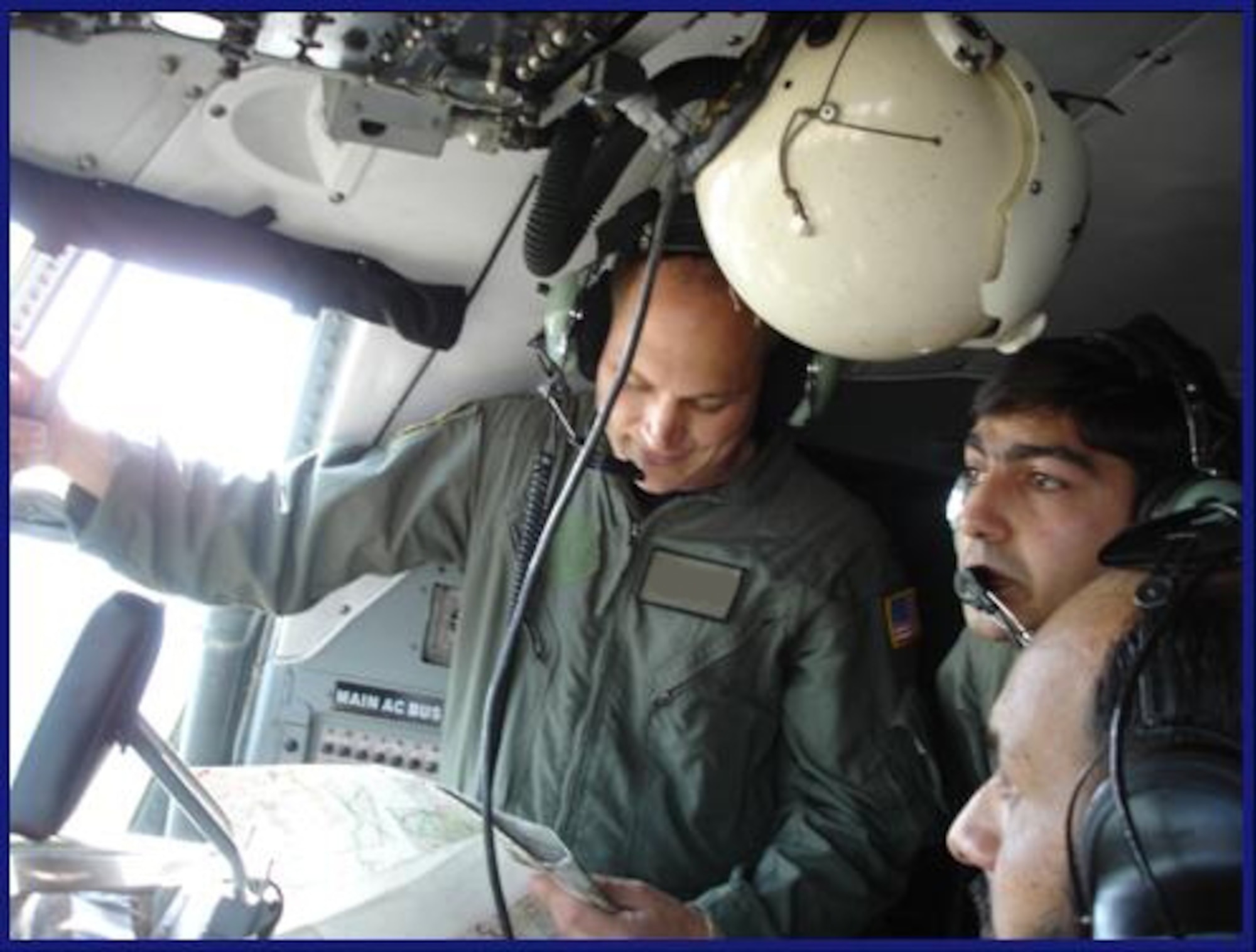 A combat aviation advisor (left) from the 6th Special Operations Squadron trains members of the Pakistani air force. To accomplish the no-fail mission of the Air Force Special Operations Command, Airmen are trained, taught and molded from their leaders. (Courtesy photo)