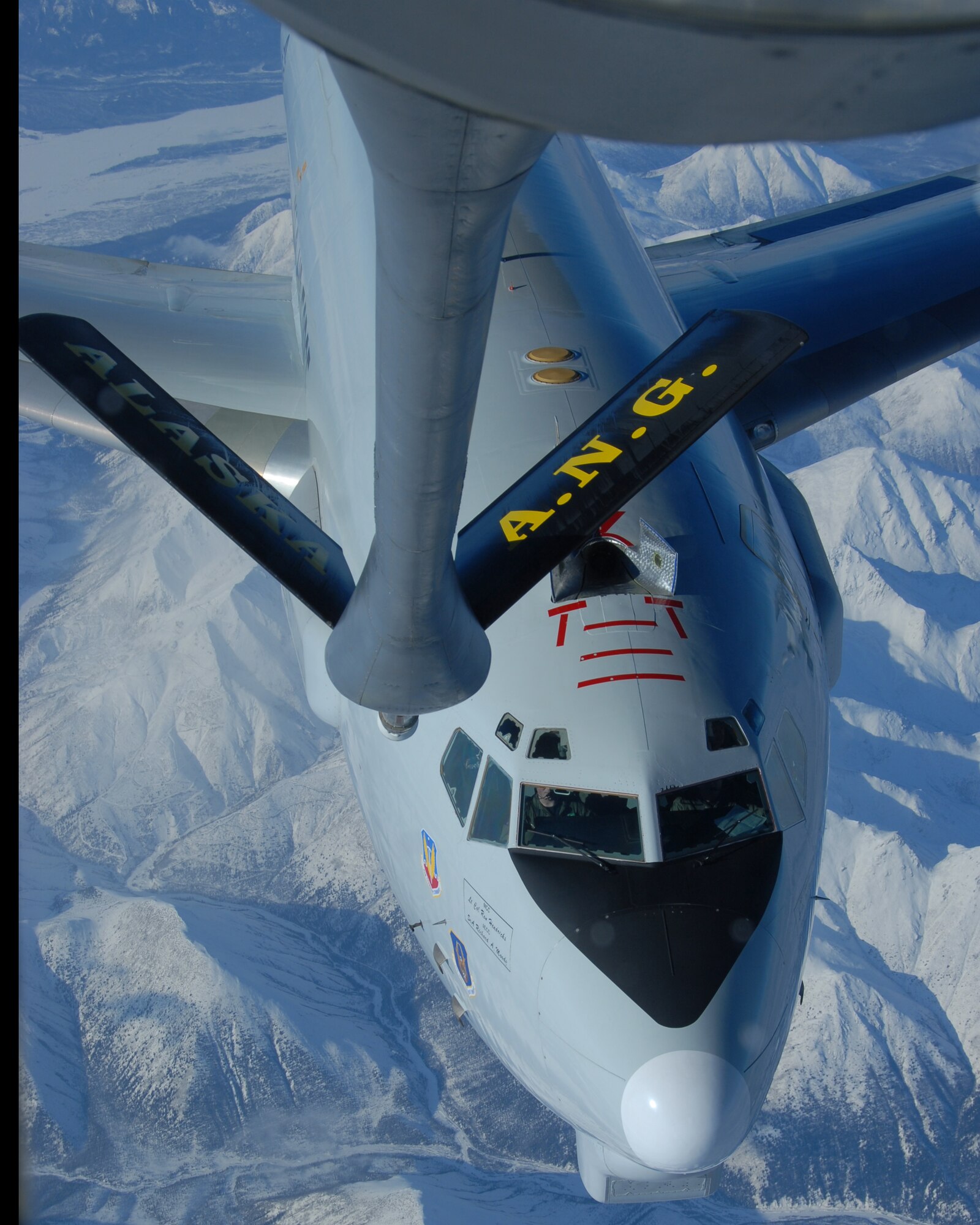 EIELSON AIR FORCE BASE, Alaska--An E-3 Sentry (AWACS) sits in the precontact position awaiting aerial refuleing by the 168th Air Refueling Wing, Alaska Air National Guard KC-135 over the arctic on 27 Feb, 2007. The AWACS is assigned to the 962nd AACS, Elmendorf AFB, Alaska.(U.S. Air Force photo by Master Sgt. Robert Wieland) 