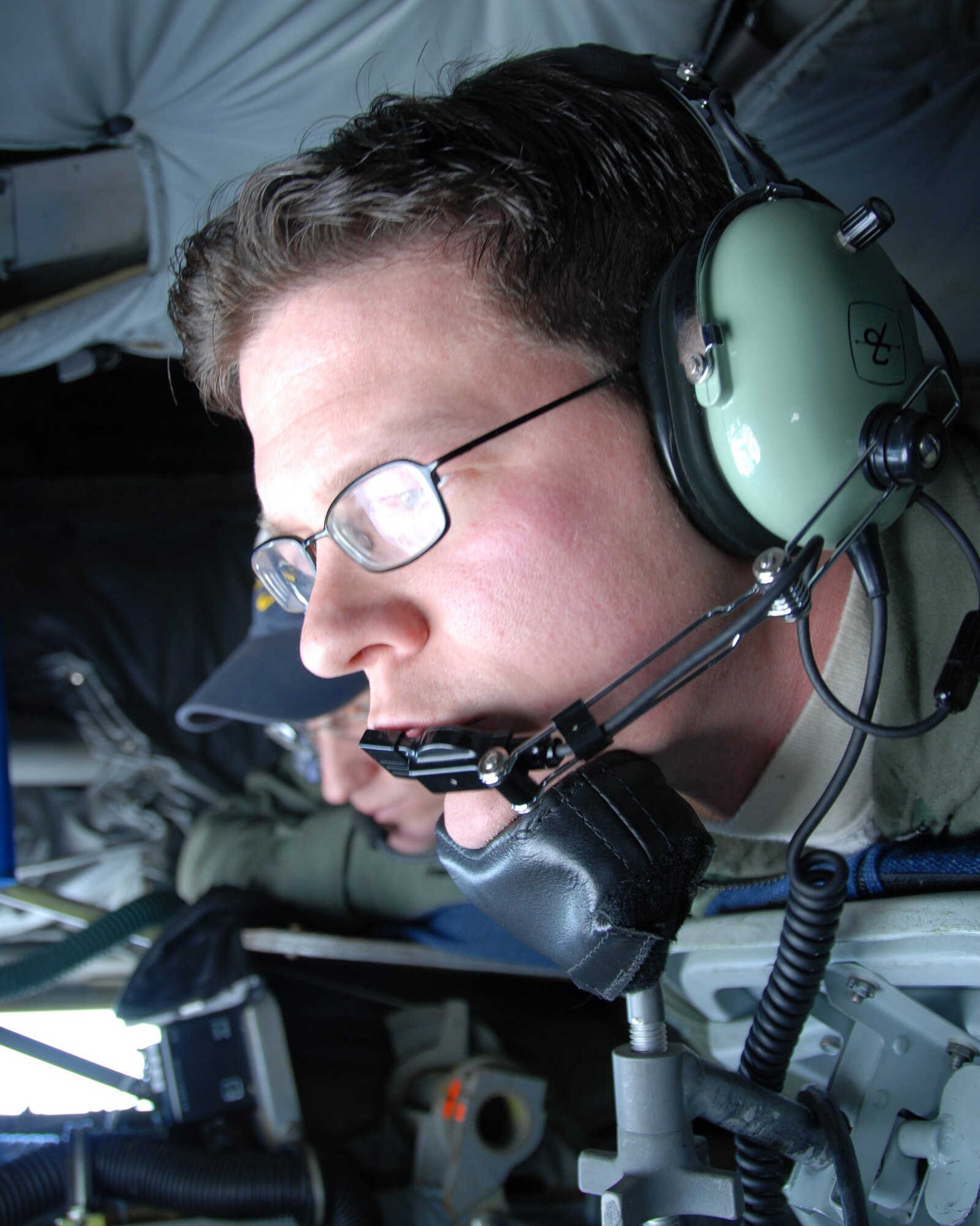 EIELSON AIR FORCE BASE, Alaska--MSgt Cain, KC-135 Boom Operator, 168 Air Refueling Squadron, 168th Air Refueling Wing, Alaska Air National Guard refuels a E-3 Sentry (AWACS) over the arctic. The AWACS is assigned to the 962nd AACS, Elmendorf AFB, Alaska.(U.S. Air Force photo by Master Sgt. Robert Wieland) 