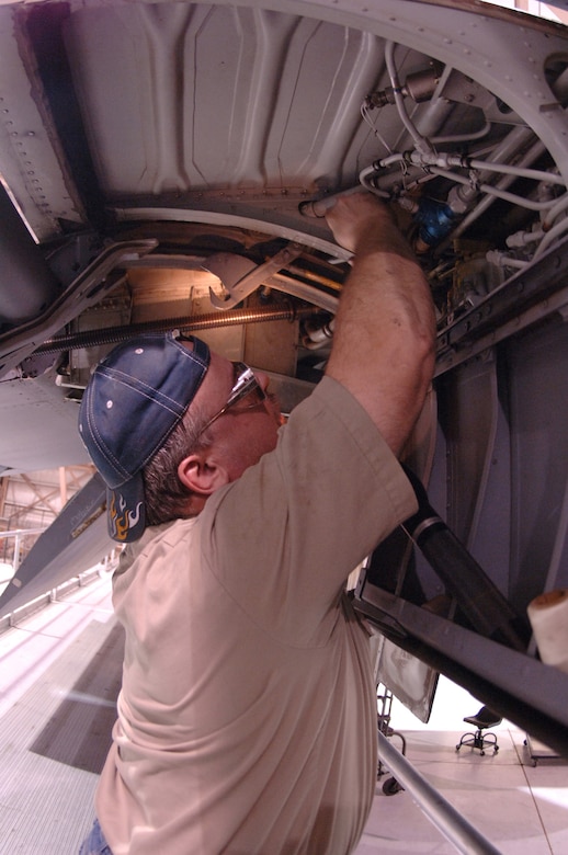GRAND FORKS AIR FORCE BASE, N.D. – Mr. Mark Heitkotter, 319th Maintenance Squadron electronic systems technician, inspects a KC-135 Stratotanker made in 1962 during a periodic inspection here Feb. 27.  The decades-old KC-135 undergoes rigorous inspections every 15 months or 1,500 flying hours to make sure it is combat ready. (U.S. Air Force photo/Airman 1st Class Chad Kellum)