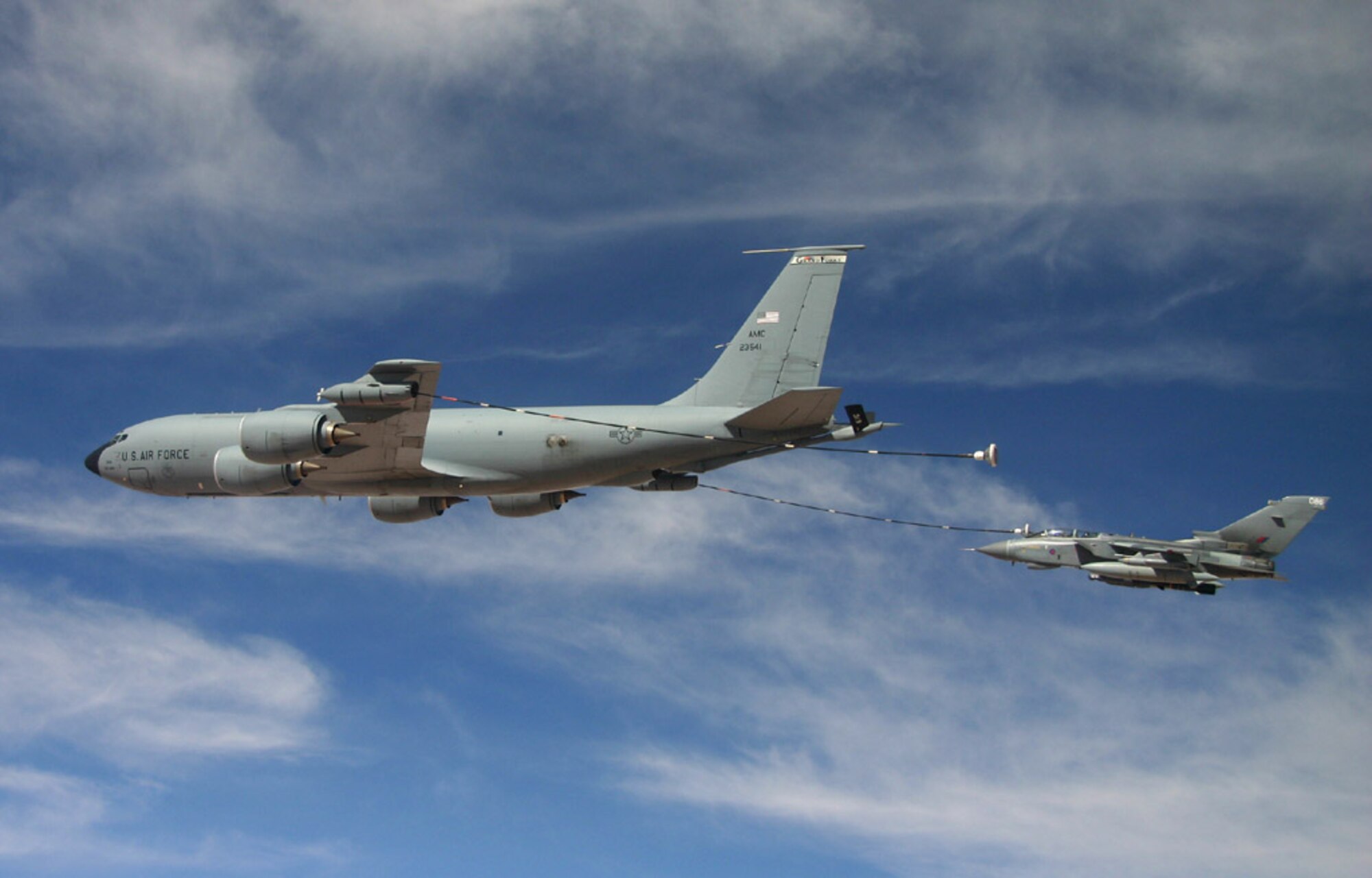 An Air Force KC-135 Stratotanker from the 340th Expeditionary Air Refueling Squadron refuels a Royal Air Force GR-4 Tornado over Iraq Feb. 25 using the multipoint refueling system.  With MPRS, Air Force tankers have the versatility to refuel Air Force, Navy and coalition aircraft all in the same mission. (Royal Air Force photo)