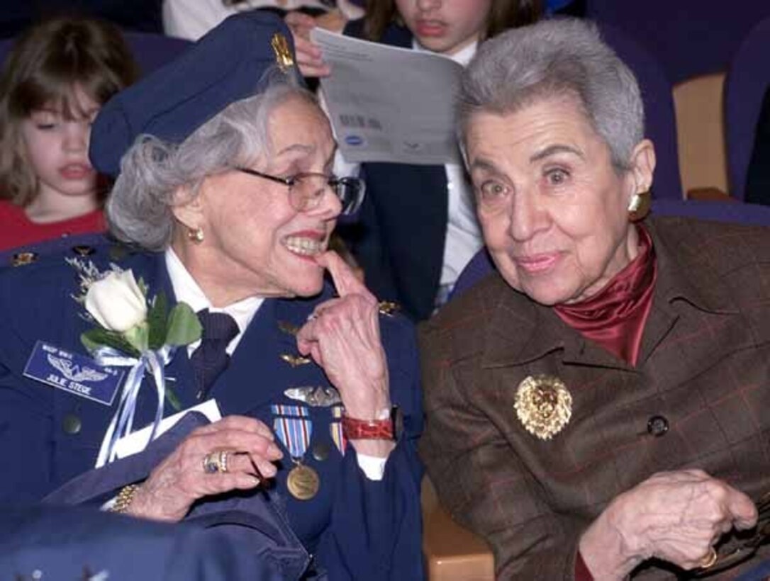 Former WASP Julie Stege (left), 91, poses with her sister, Evelyn Stefansson Nef, 90, at the world premiere of the film "Above & Beyond: 100 Years of Women in Aviation" March 10, 2003, at the Women's Memorial at the gateway to Arlington (Va.) National Cemetery. Photo by Rudi Williams. 