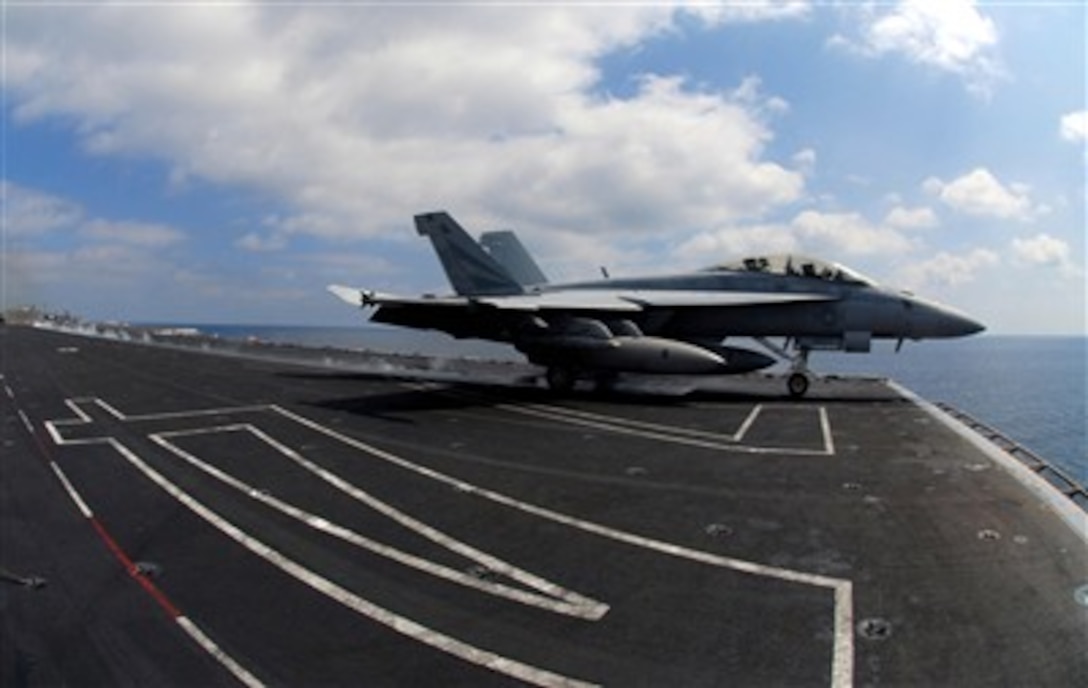 An F/A-18F Super Hornet aircraft assigned to the "Black Knights" of Strike Fighter Squadron 154 launches from the flight deck of USS John C. Stennis, Feb. 26, 2007, while under way in the Arabian Sea. The John C. Stennis Carrier Strike Group is on a regularly scheduled deployment in support of maritime security operations.