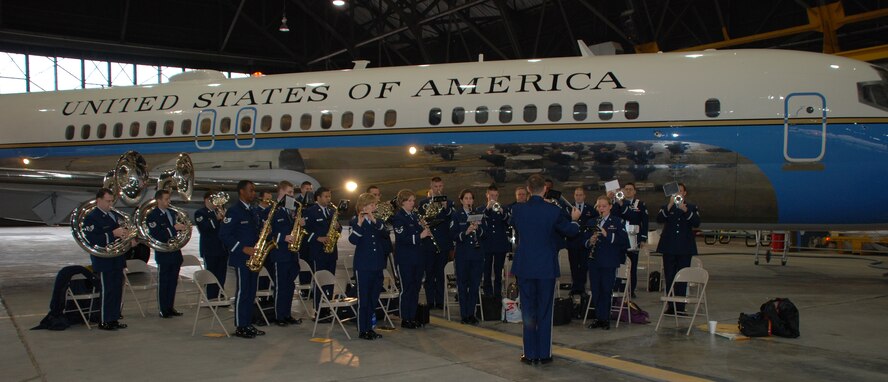 The 932nd Airlift Wing welcomes a new C-40C Distinguished Visitor airplane (right) straight from the factory with music by the Air Force Reserve Command band.
