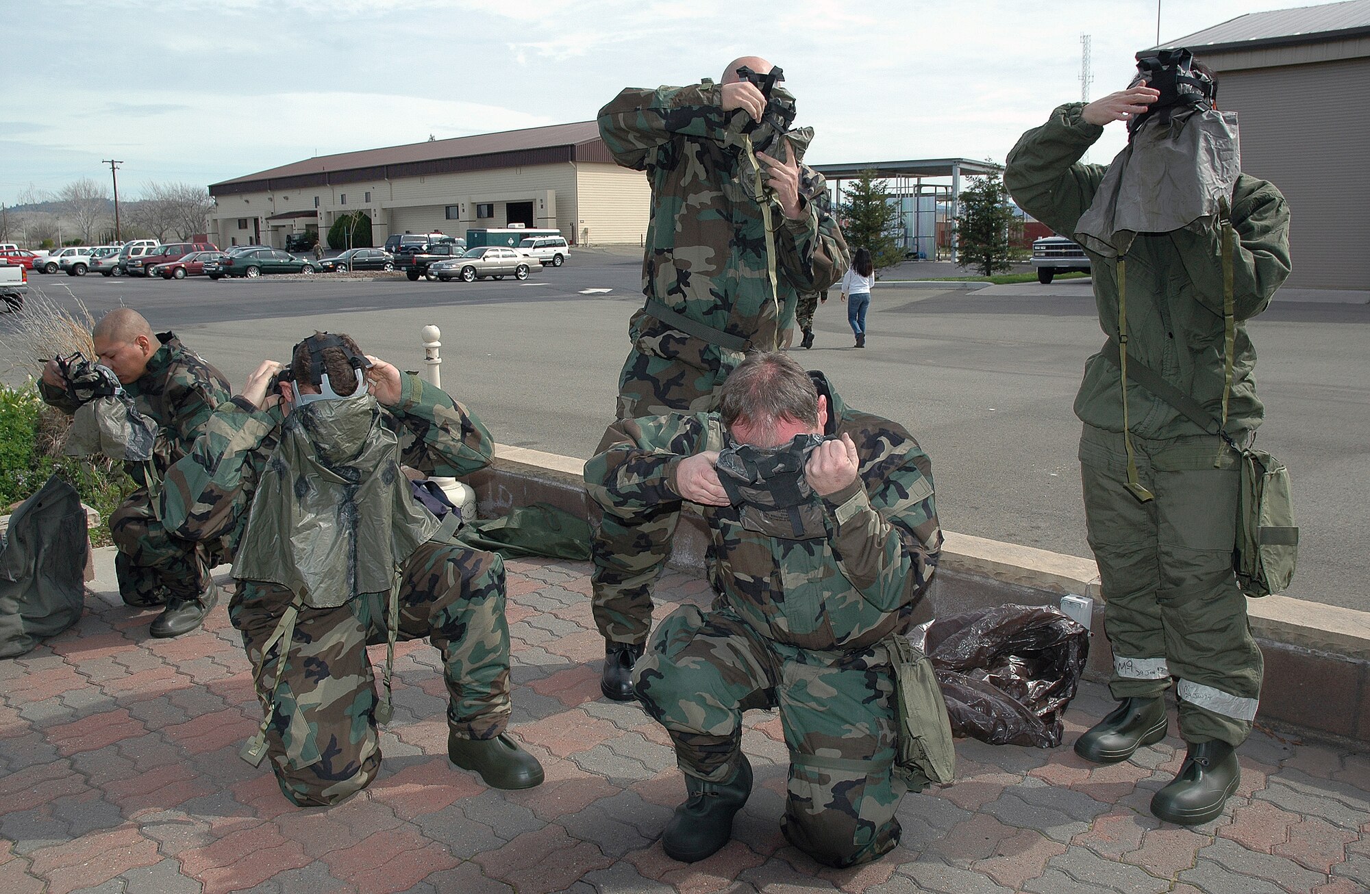 BEALE AIR FORCE BASE, Calif.- Citizen Warriors from the Air Force Reserve Command's 940th Air Refueling Wing at Beale Air Force Base, Calif. train on how to properly don chemical protective gear during a Unit Training Assembly March 4, 2007. Air Force Reservists are required to maintain the same level of combat readiness as their active duty counterparts. 
(U.S. Air Force Photo/ Staff Sgt. Luke Johnson)
