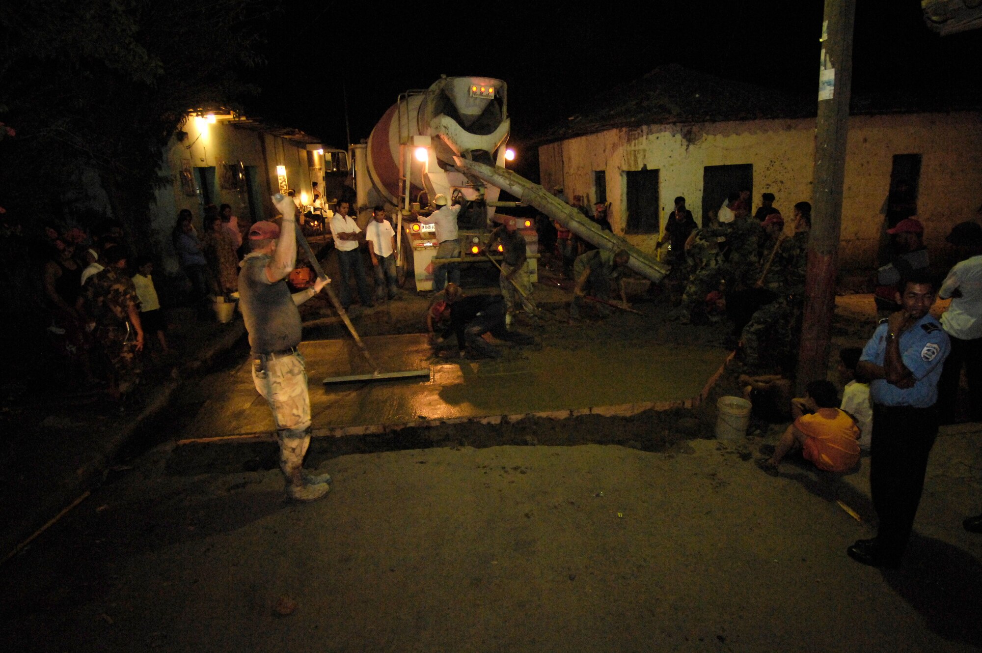 Airmen deployed with 820th Expeditionary Red Horse Squadron smooth freshly poured concrete March 2 for a new roadway in Santa Teresa, Nicaragua.  The effort was part of New Horizons-Nicaragua 2007, a $7.25 million joint U.S. and Nicaraguan military humanitarian and training exercise, providing a new school, and medical clinic, as well as free health and veterinary care, giving aid and strengthening bonds between the two nations.  (U.S. Air Force photo/Tech. Sgt. Kevin P. Milliken)