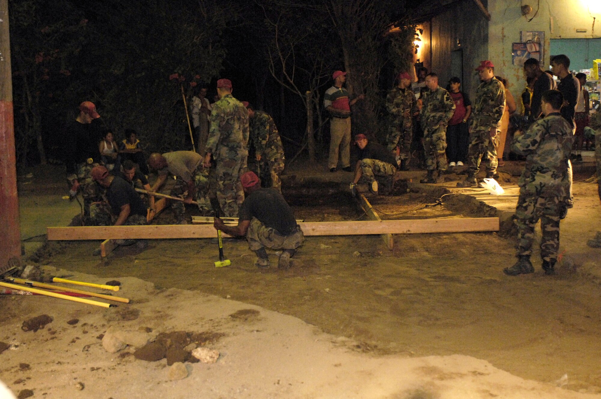 Airmen deployed with 820th Expeditionary Red Horse Squadron work on replacing a roadway March 2 in Santa Teresa, Nicaragua.  The effort was part of New Horizons-Nicaragua 2007, a $7.25 million joint U.S. and Nicaraguan military humanitarian and training exercise, providing a new school, and medical clinic, as well as free health and veterinary care, giving aid and strengthening bonds between the two nations. (U.S. Air Force photo/Tech. Sgt. Kevin P. Milliken)