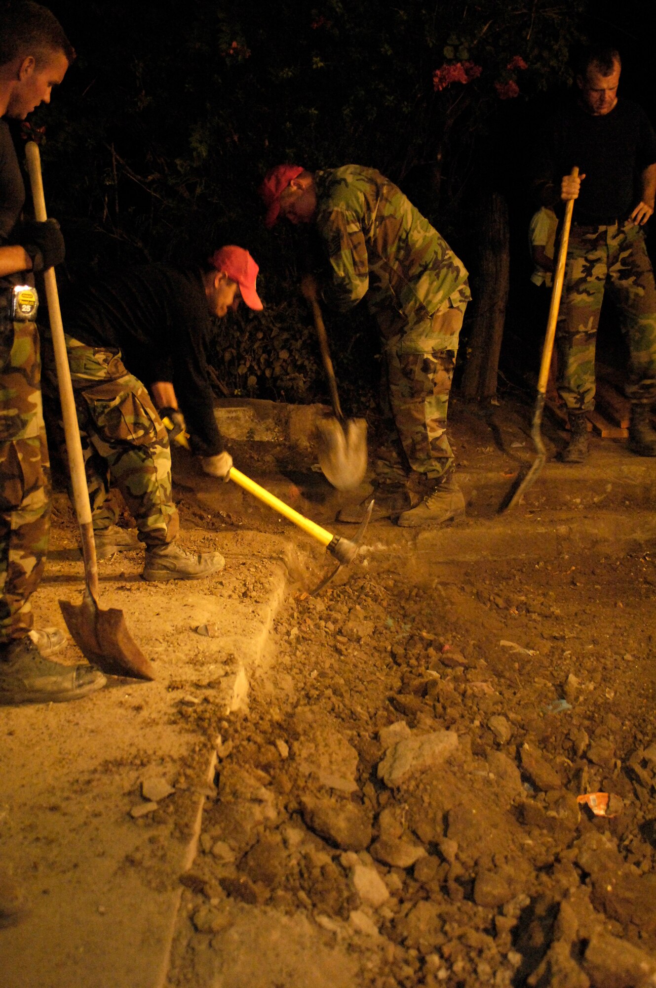 Airmen deployed with 820th Expeditionary Red Horse Squadron work on replacing a roadway March 2 in Santa Teresa, Nicaragua.  The effort was part of New Horizons-Nicaragua 2007, a $7.25 million joint U.S. and Nicaraguan military humanitarian and training exercise, providing a new school, and medical clinic, as well as free health and veterinary care, giving aid and strengthening bonds between the two nations. (U.S. Air Force photo/Tech. Sgt. Kevin P. Milliken)