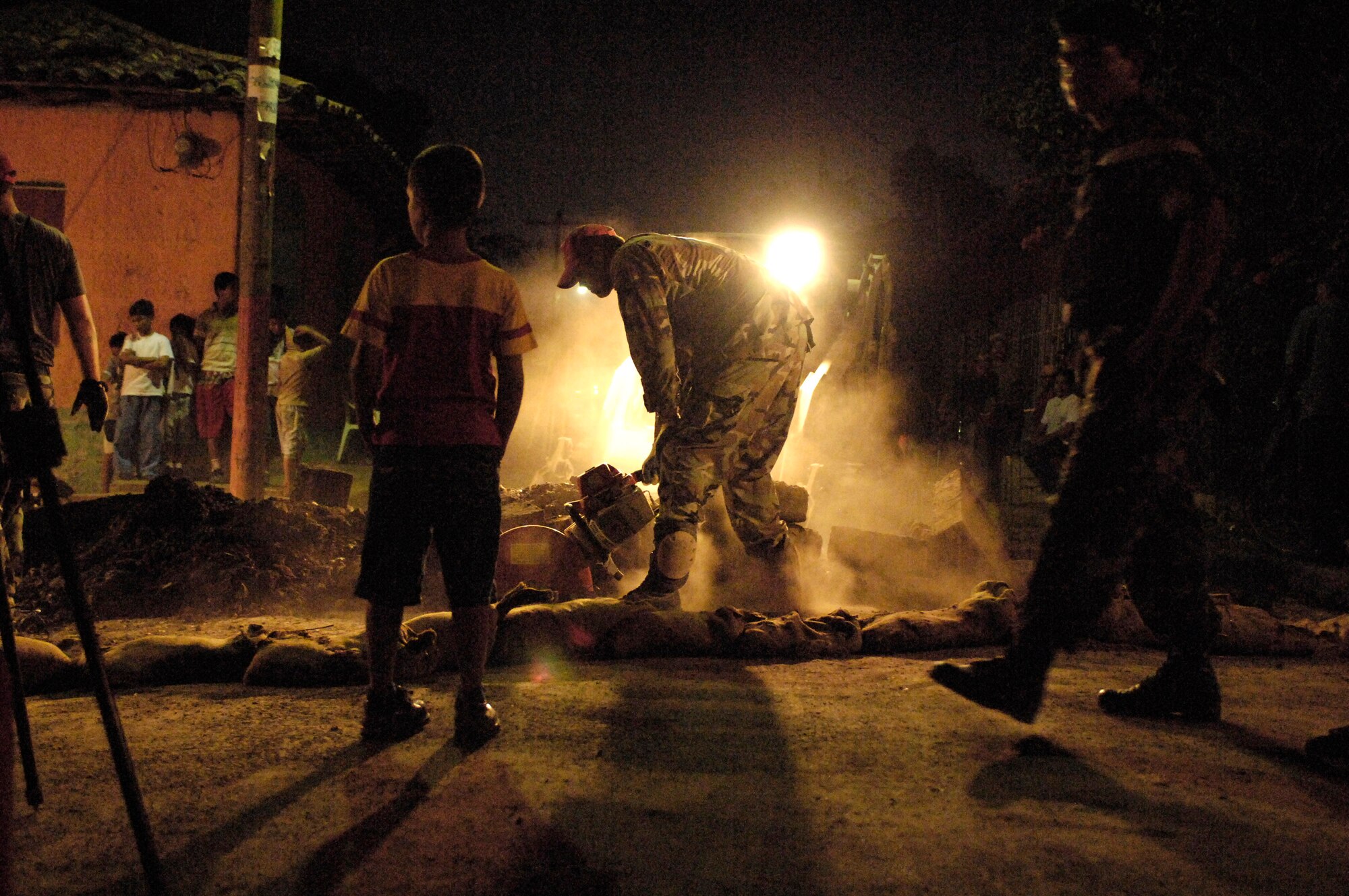 Staff Sgt. Brian Vaden cuts through the surface of an old road March 2 in Santa Teresa, Nicaragua, in preparation to replace the roadway. The effort was part of New Horizons-Nicaragua 2007, a $7.25 million joint U.S. and Nicaraguan military humanitarian and training exercise, providing a new school and medical clinic, as well as free health and veterinary care, giving aid and strengthening bonds between the two nations. Sergeant Vaden is deployed with 820th Expeditionary Red Horse Squadron.  (U.S. Air Force photo/Tech. Sgt. Kevin P. Milliken)